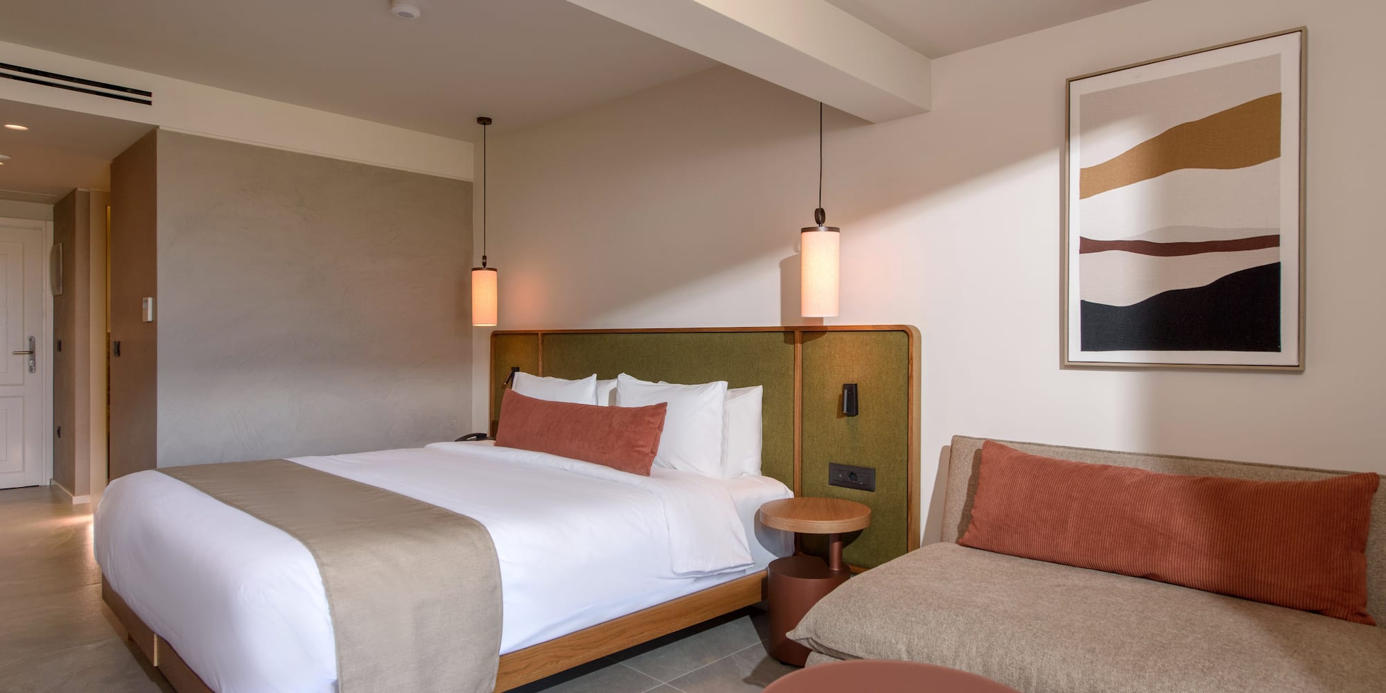 a room with a bed and a couch.