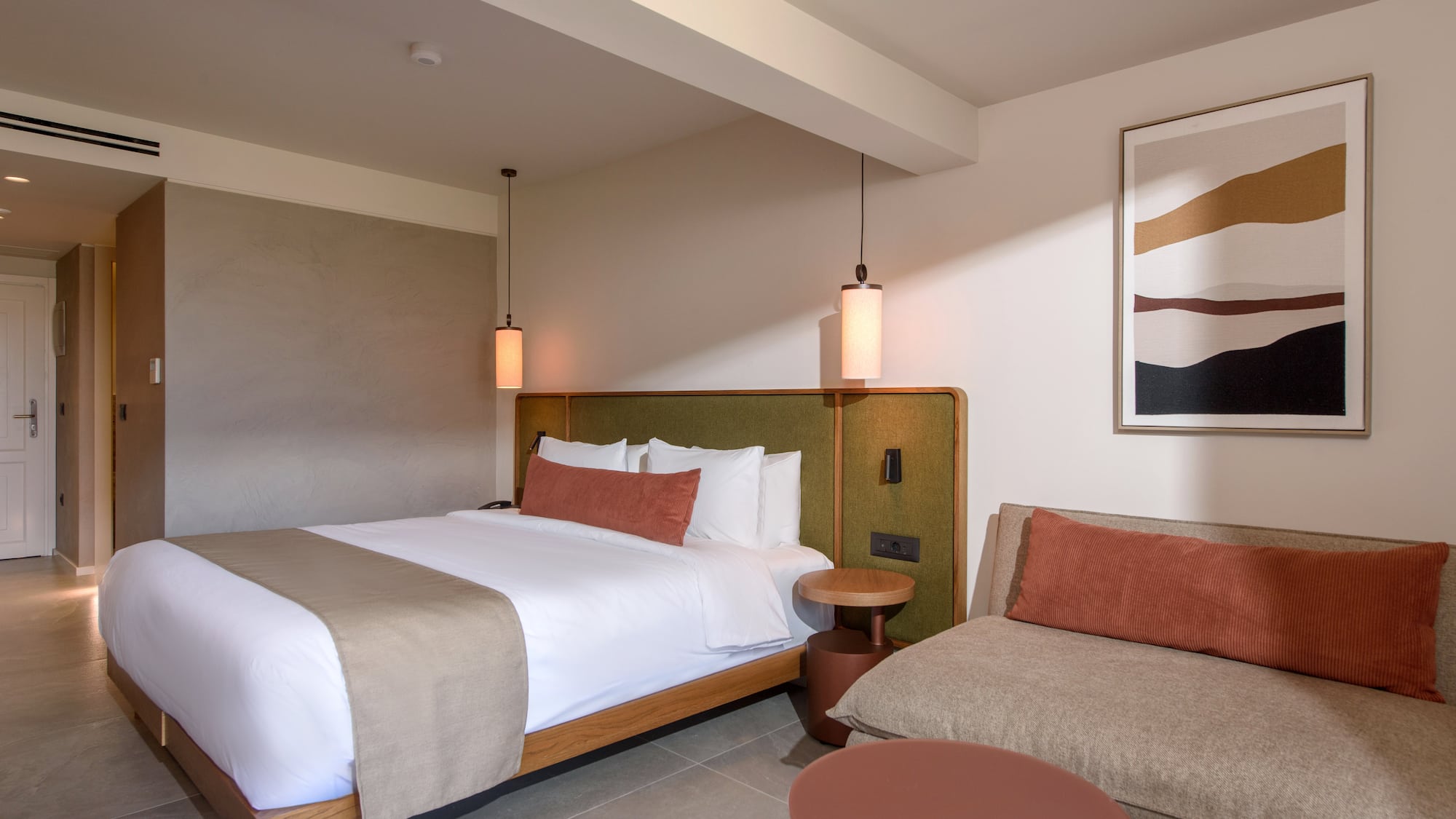 a room with a bed and a couch.