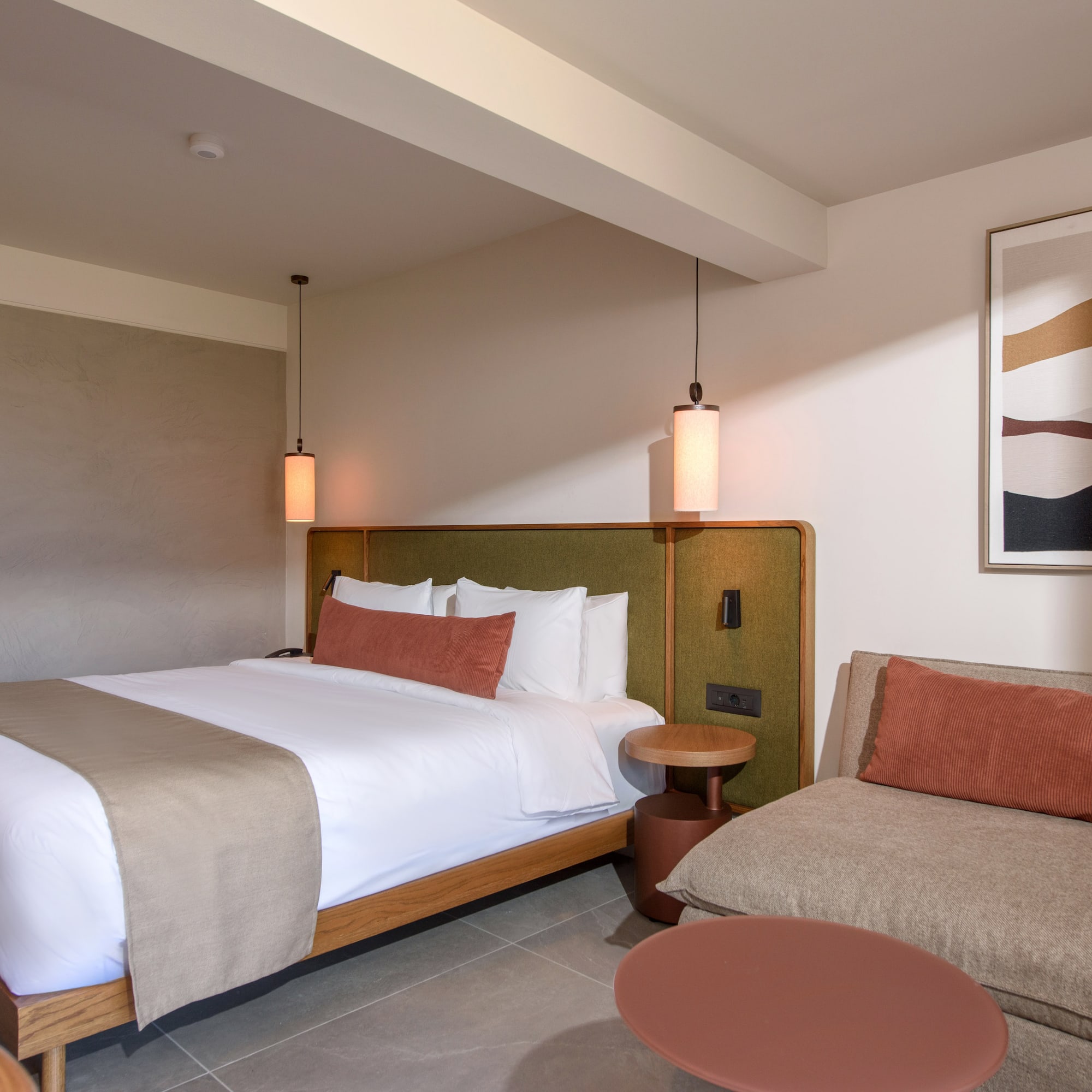 a room with a bed and a couch.