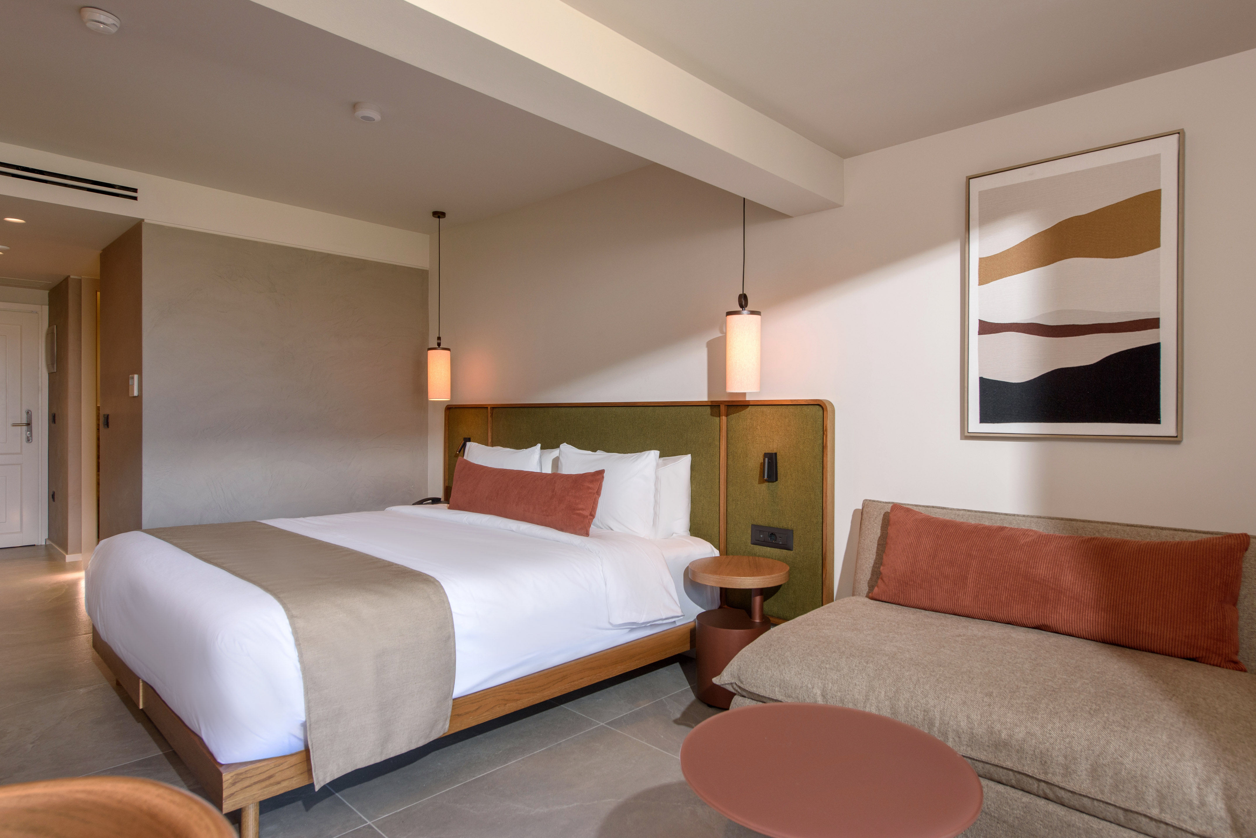 a room with a bed and a couch.