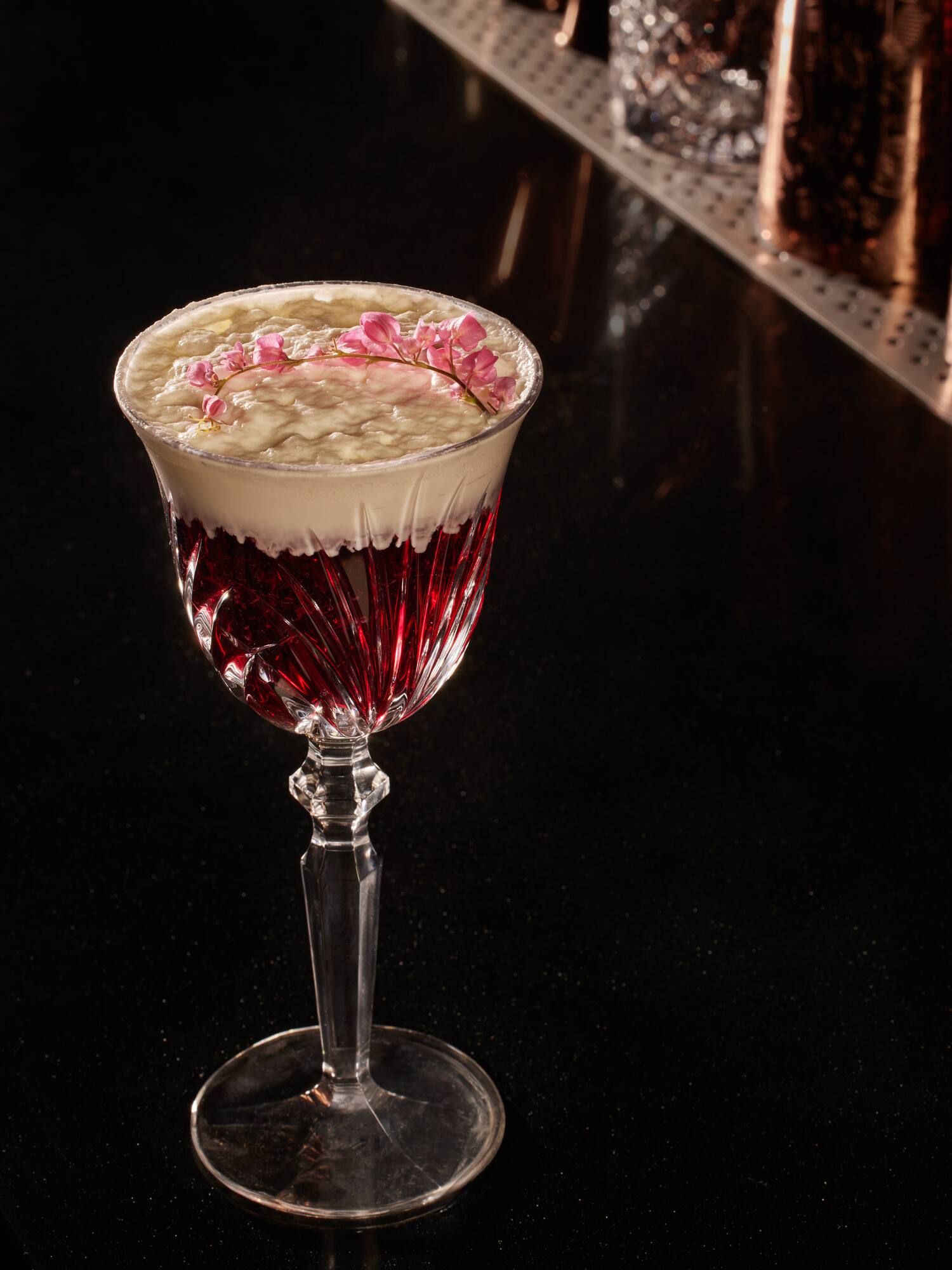 a glass with a drink in it