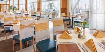 a room with tables and chairs