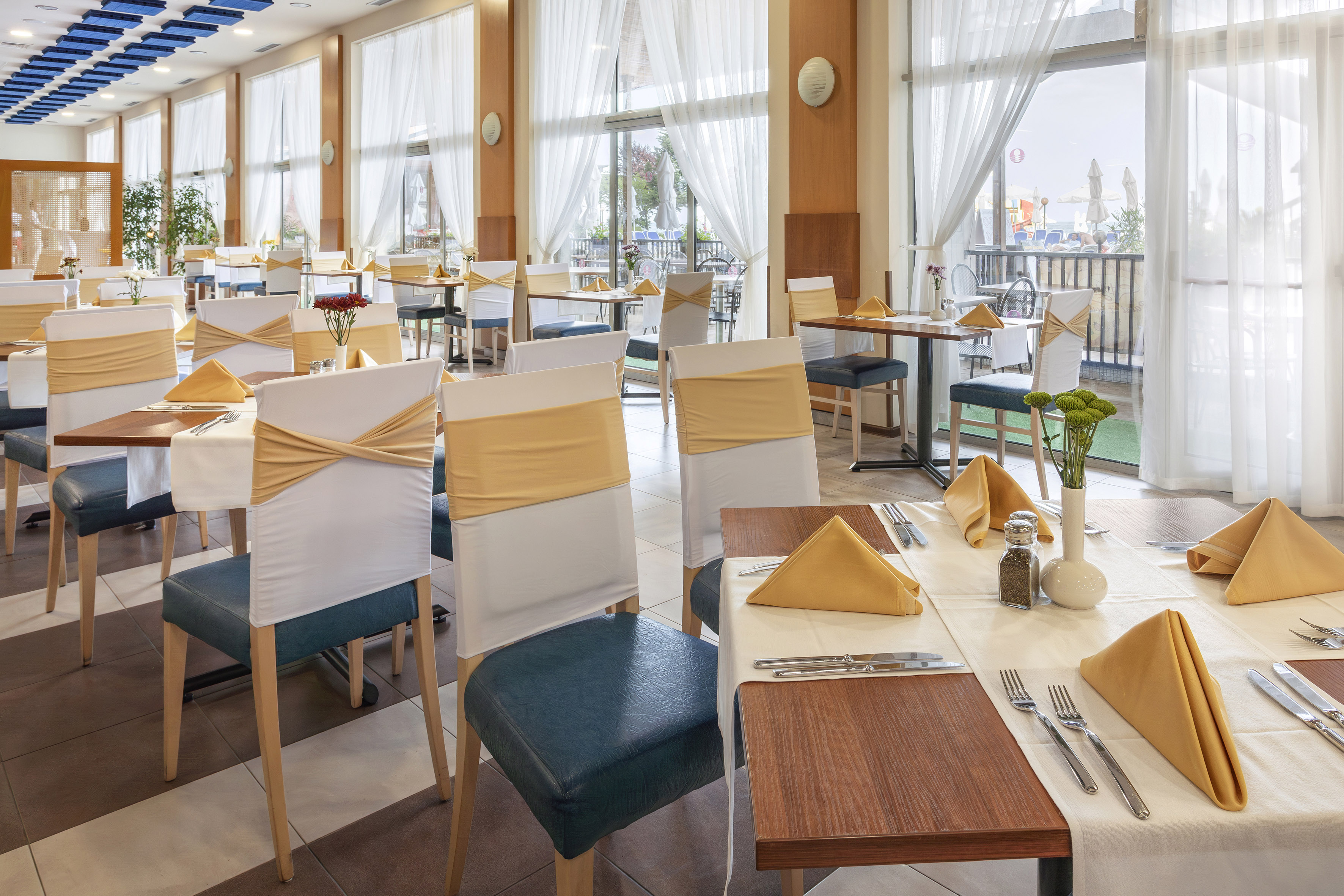 a room with tables and chairs