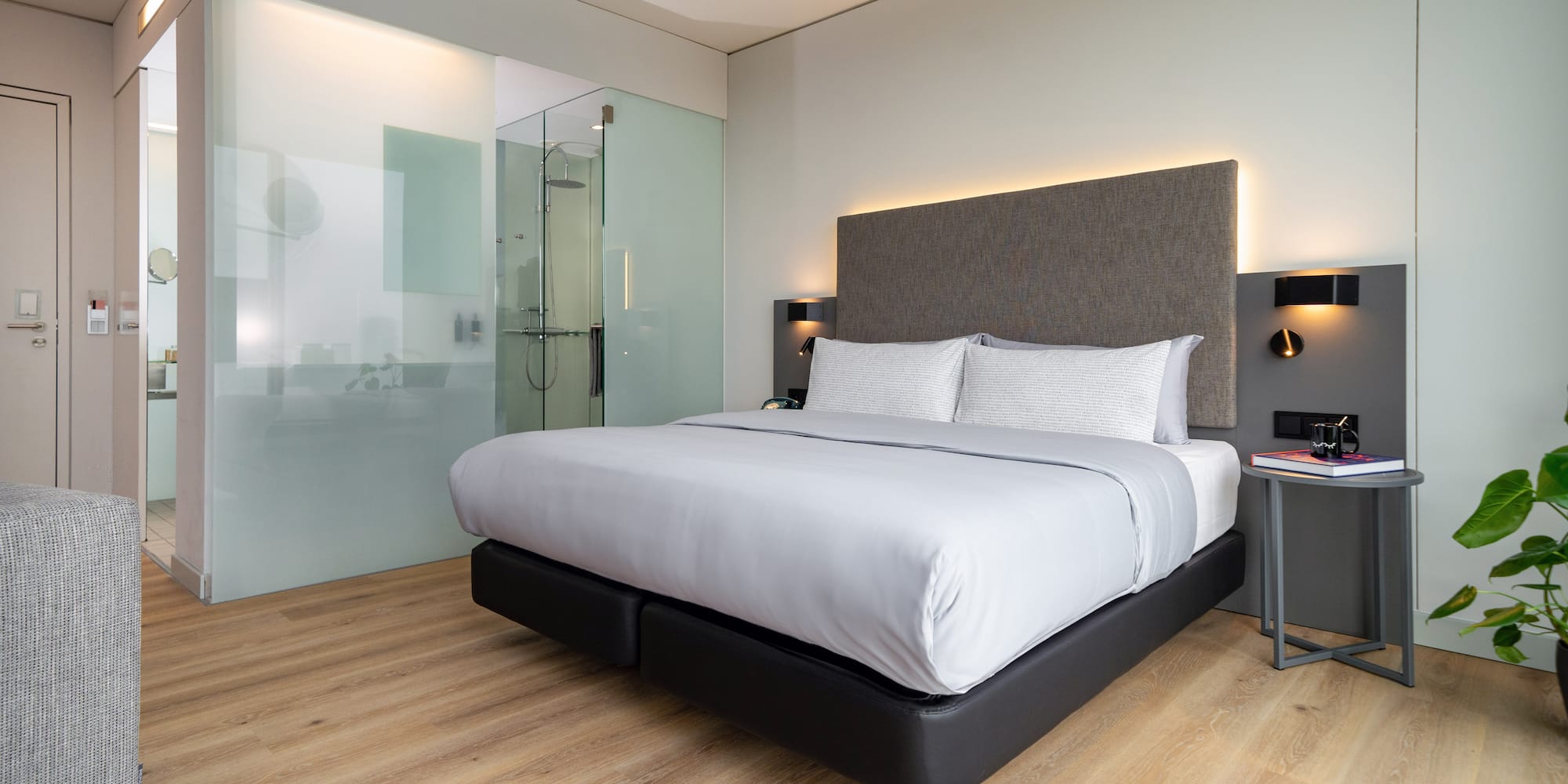 a bed with a glass door