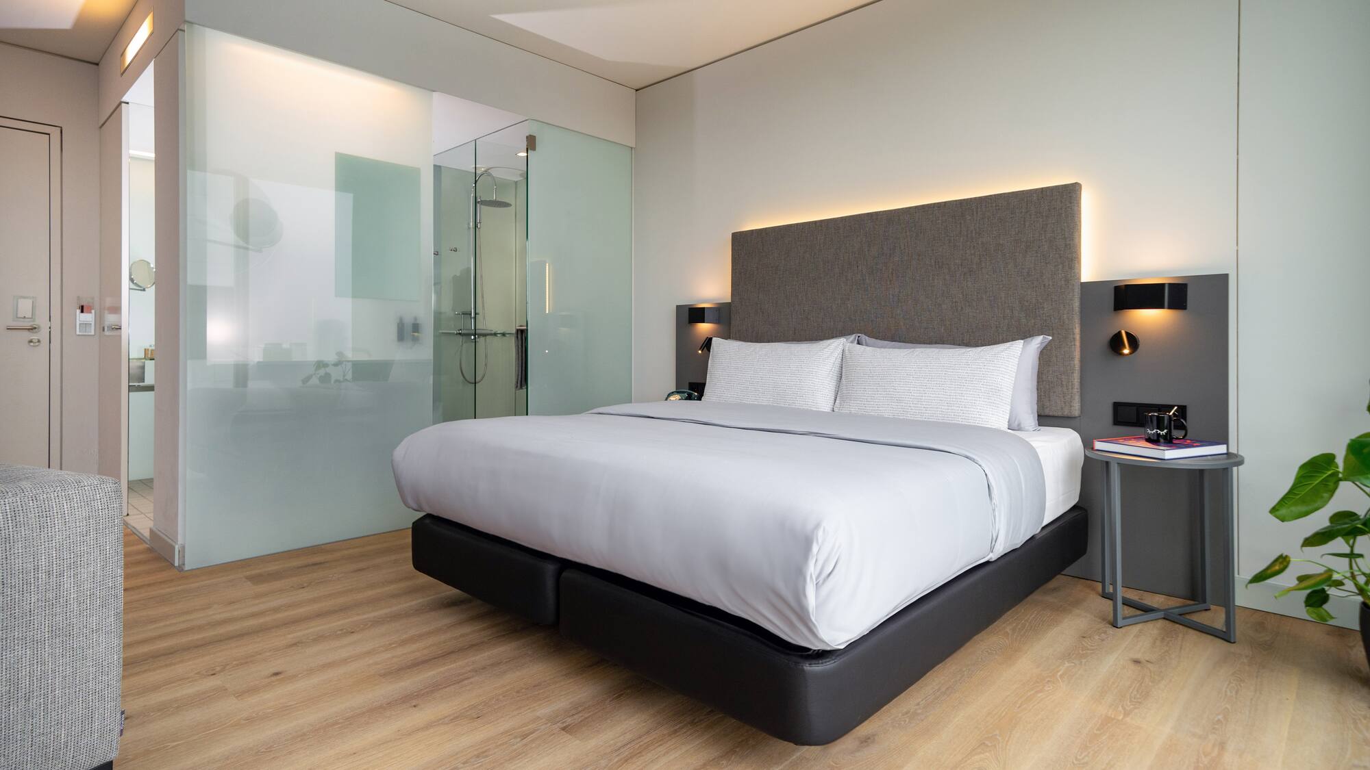 a bed with a glass door
