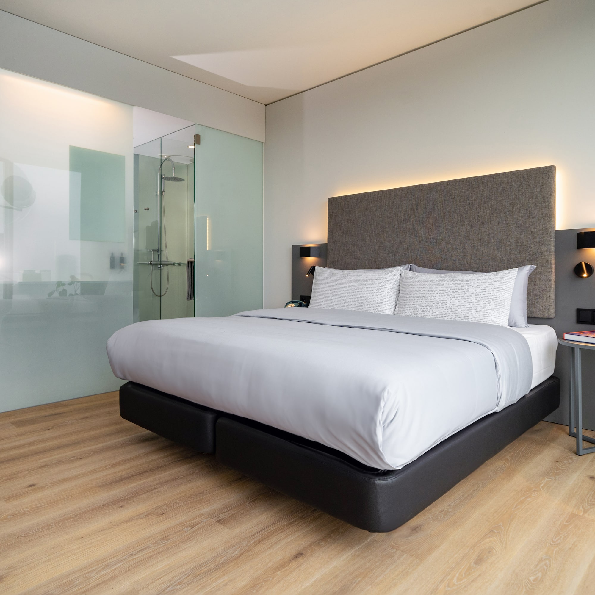 a bed with a glass door