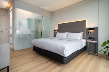 a bed with a glass door