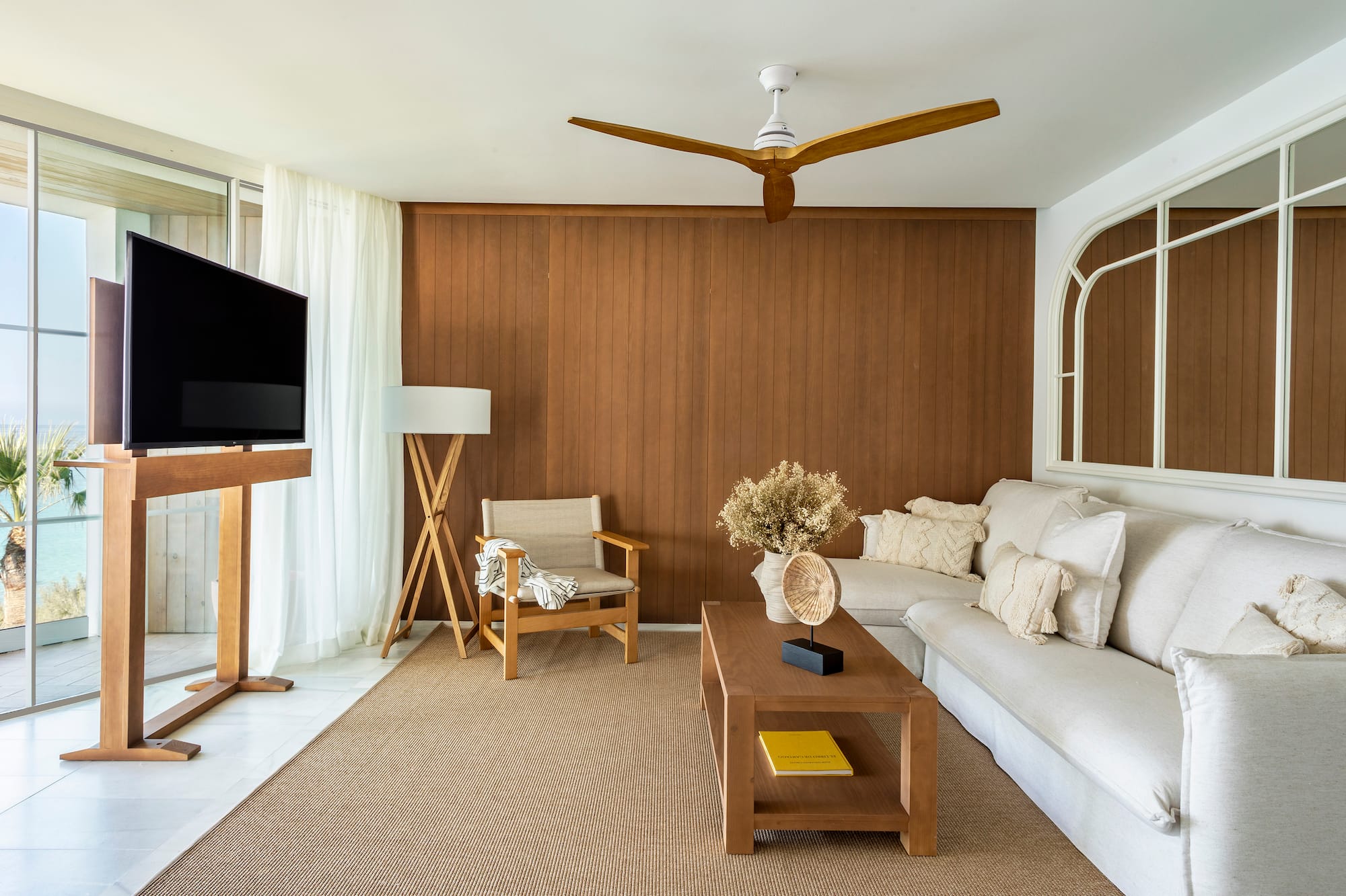 a living room with a television and a couch