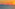 Orange sunset over ocean with two small islands and bright sun.