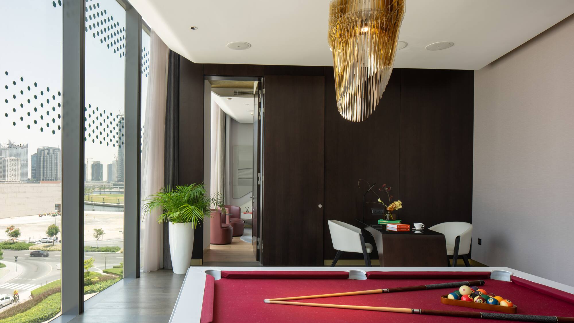 a pool table with a pool cue and a pool stick in it