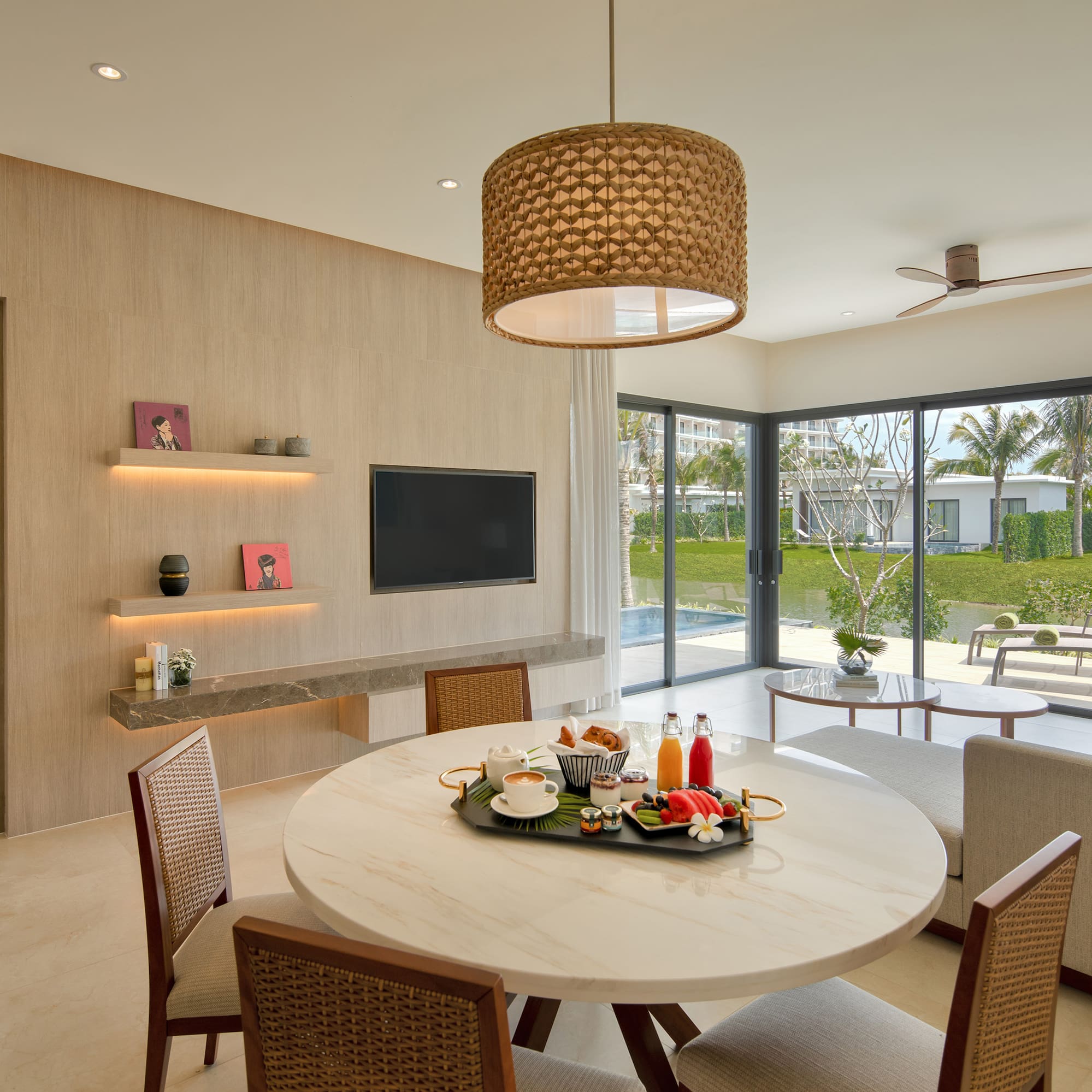 a dining room with a table and chairs