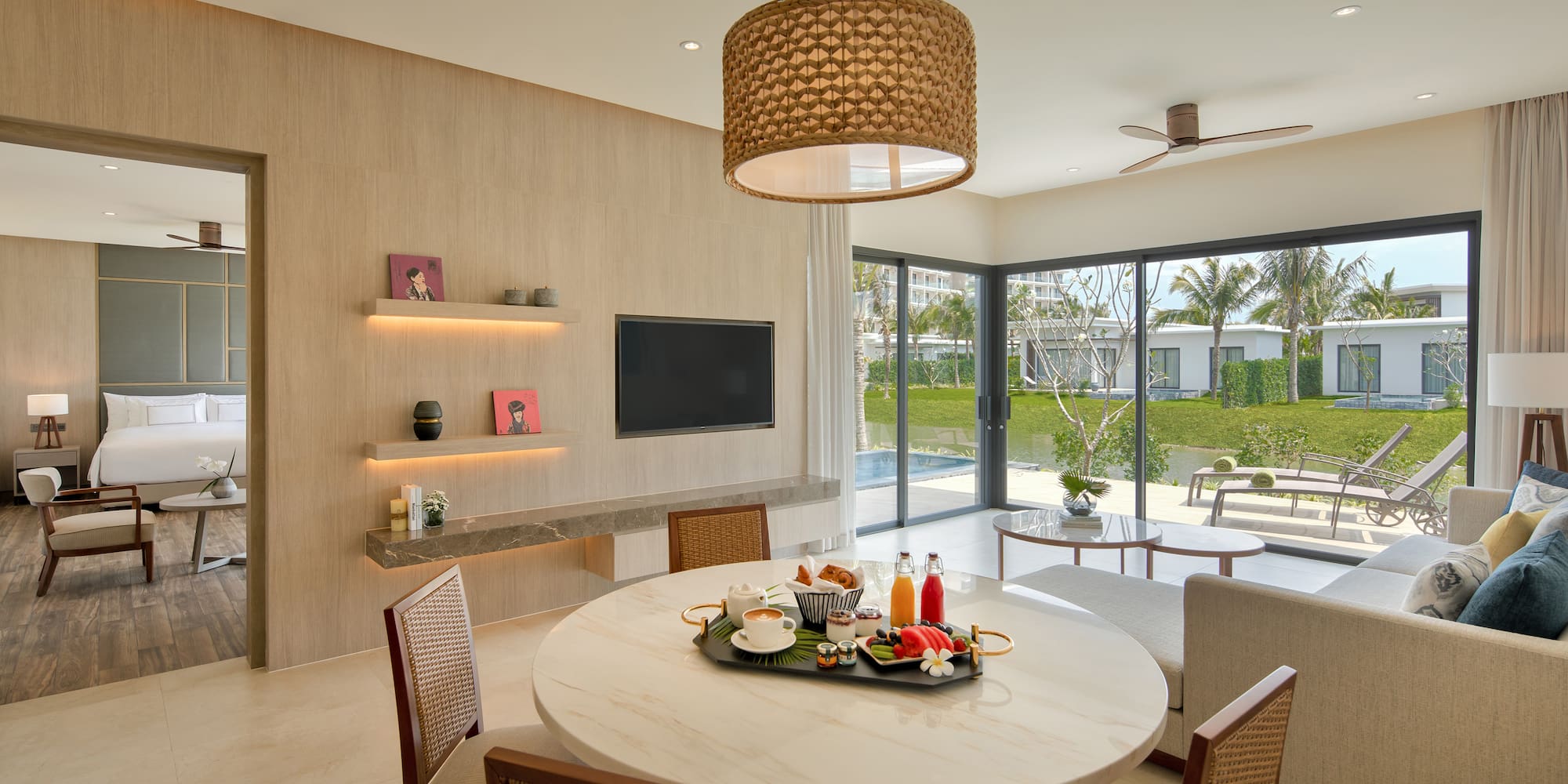 a dining room with a table and chairs
