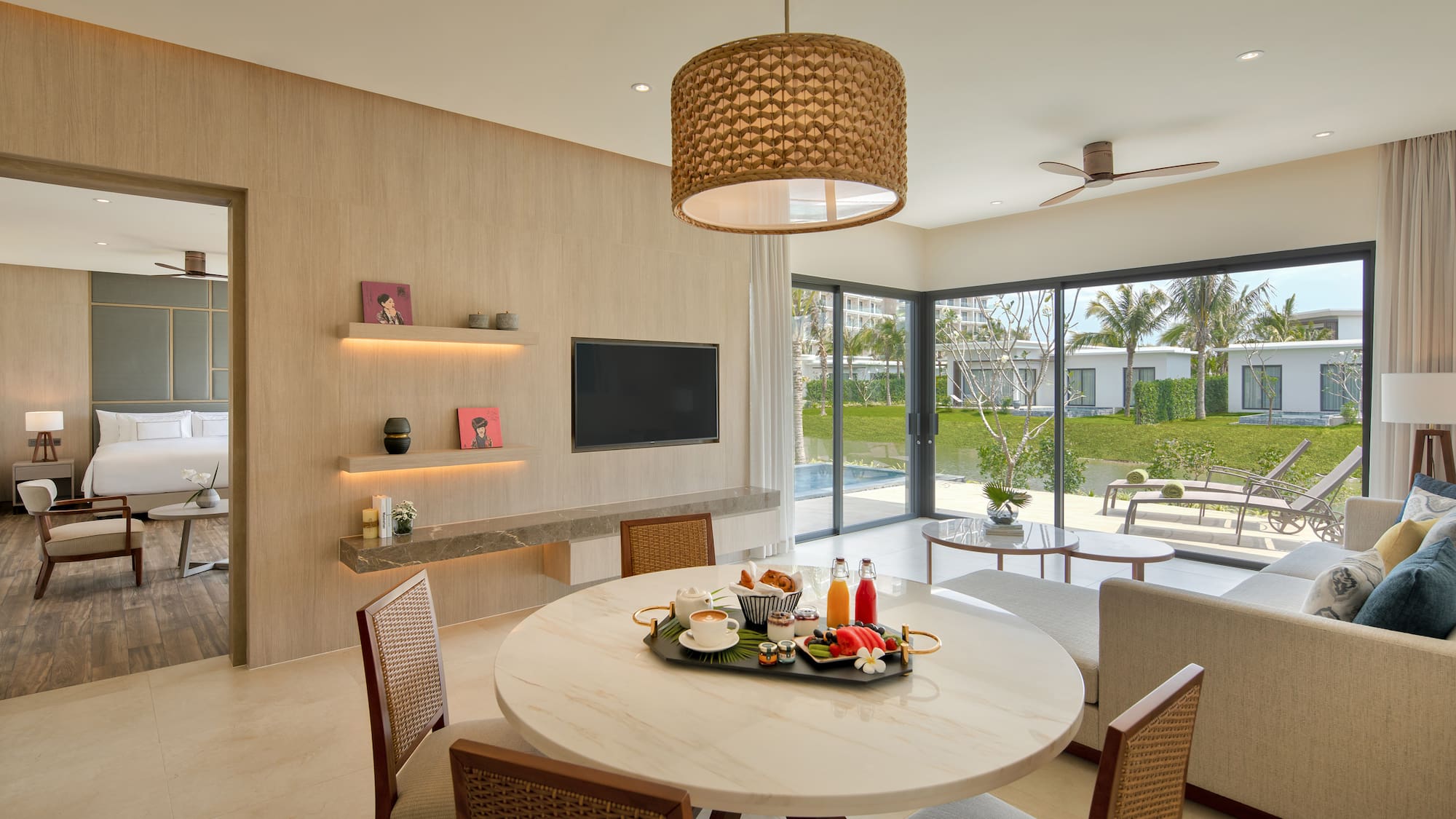 a dining room with a table and chairs