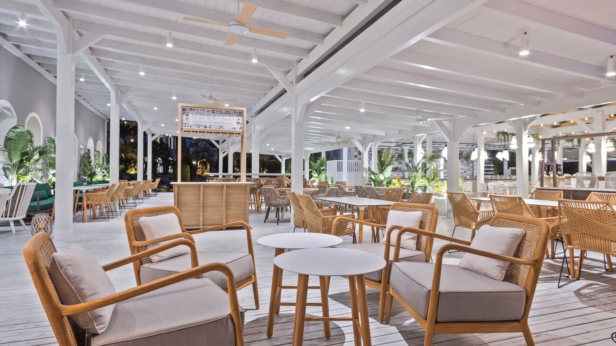 a room with chairs and tables