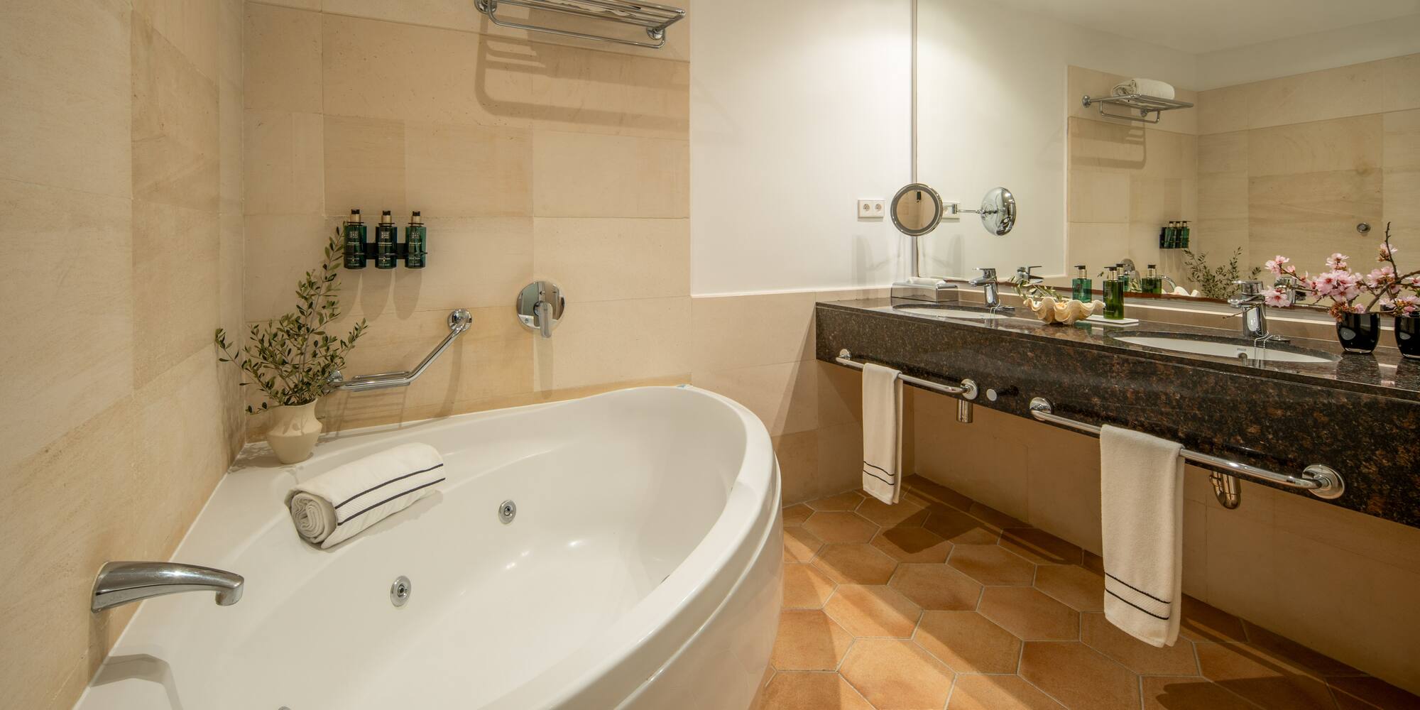 a bathroom with a tub and sink