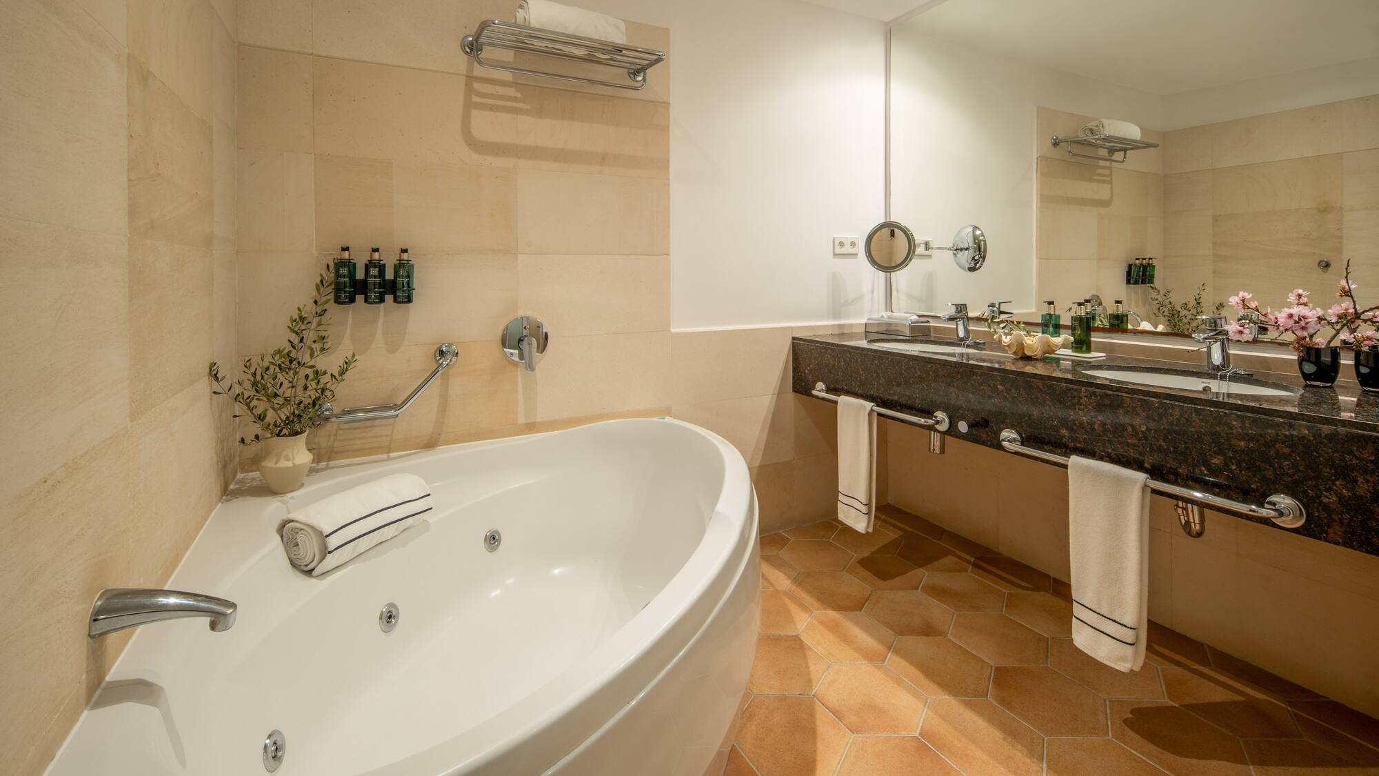 a bathroom with a tub and sink