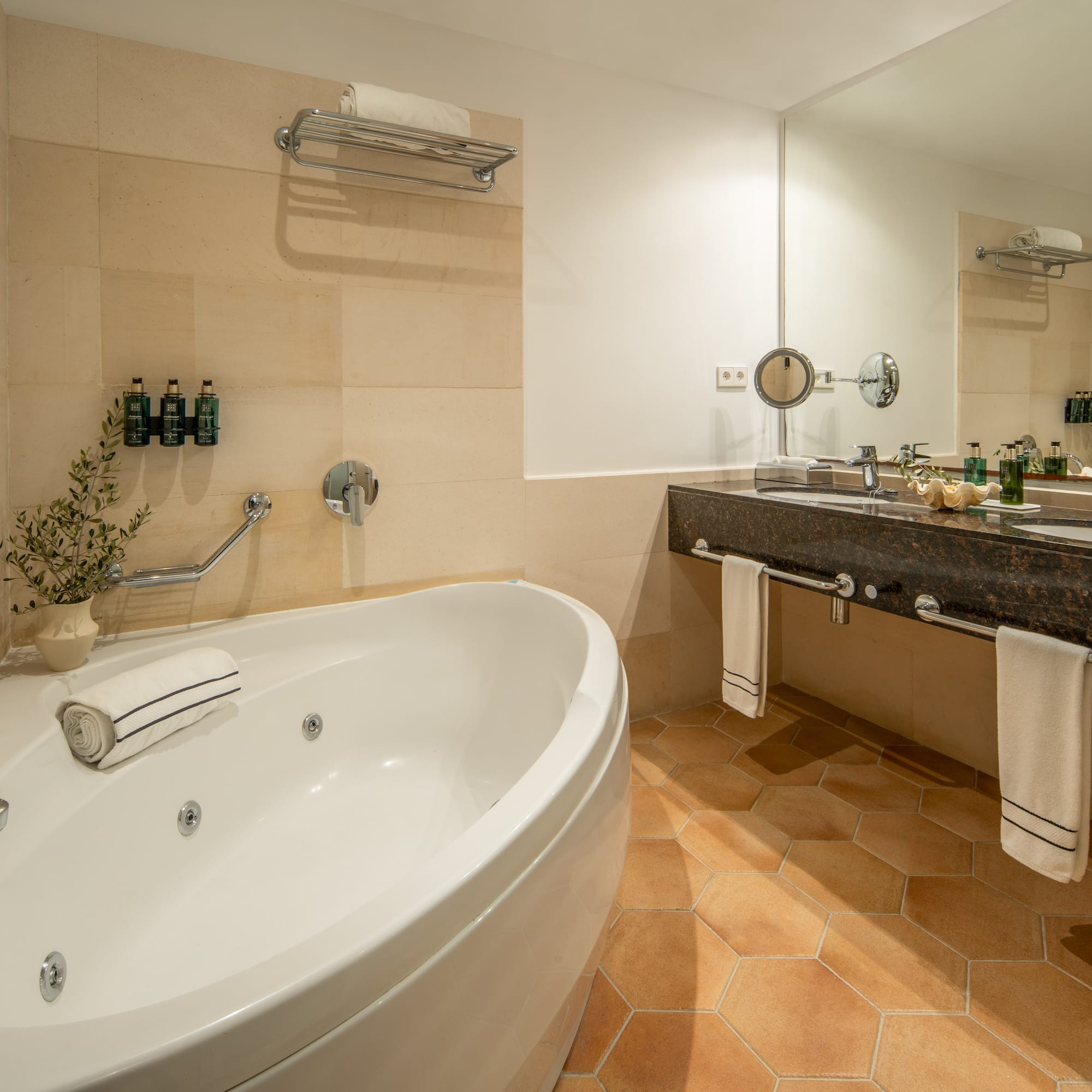 a bathroom with a tub and sink