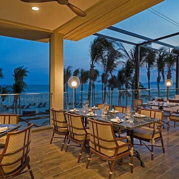 a restaurant with tables and chairs