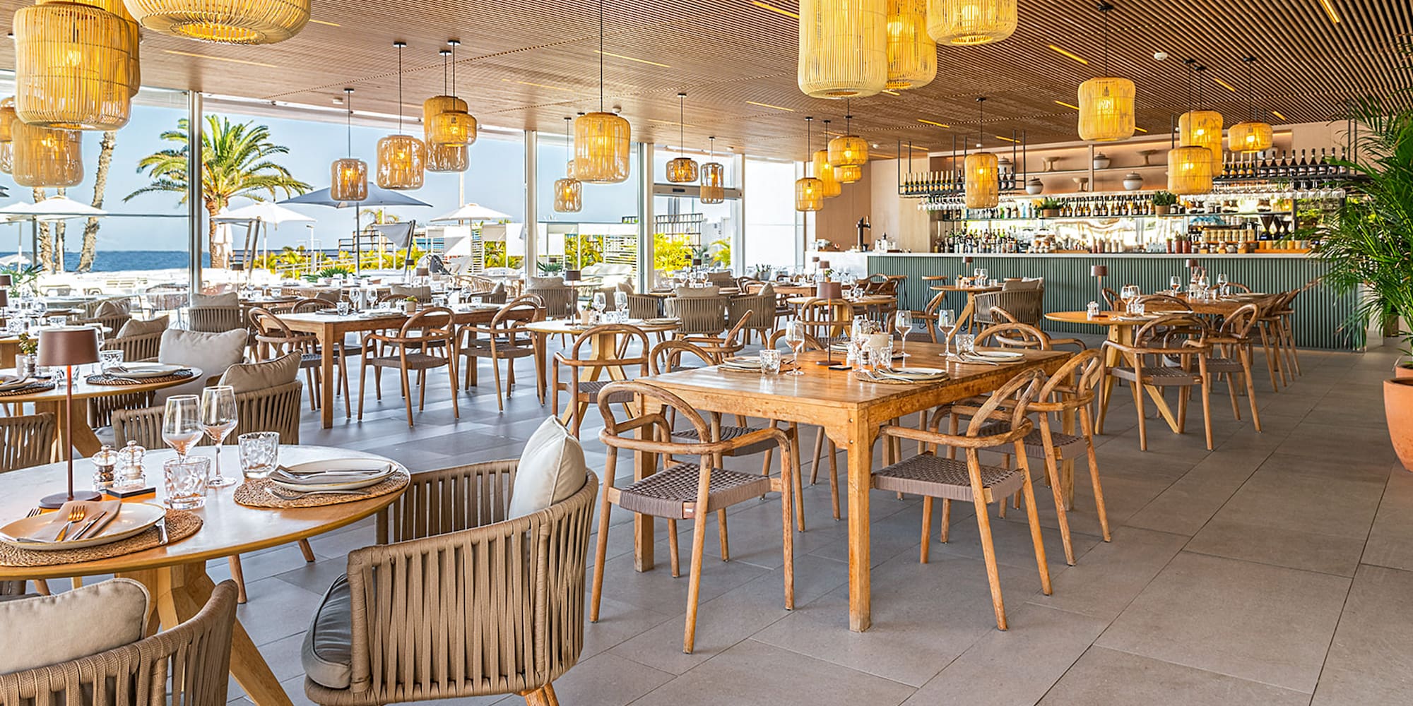 a restaurant with tables and chairs