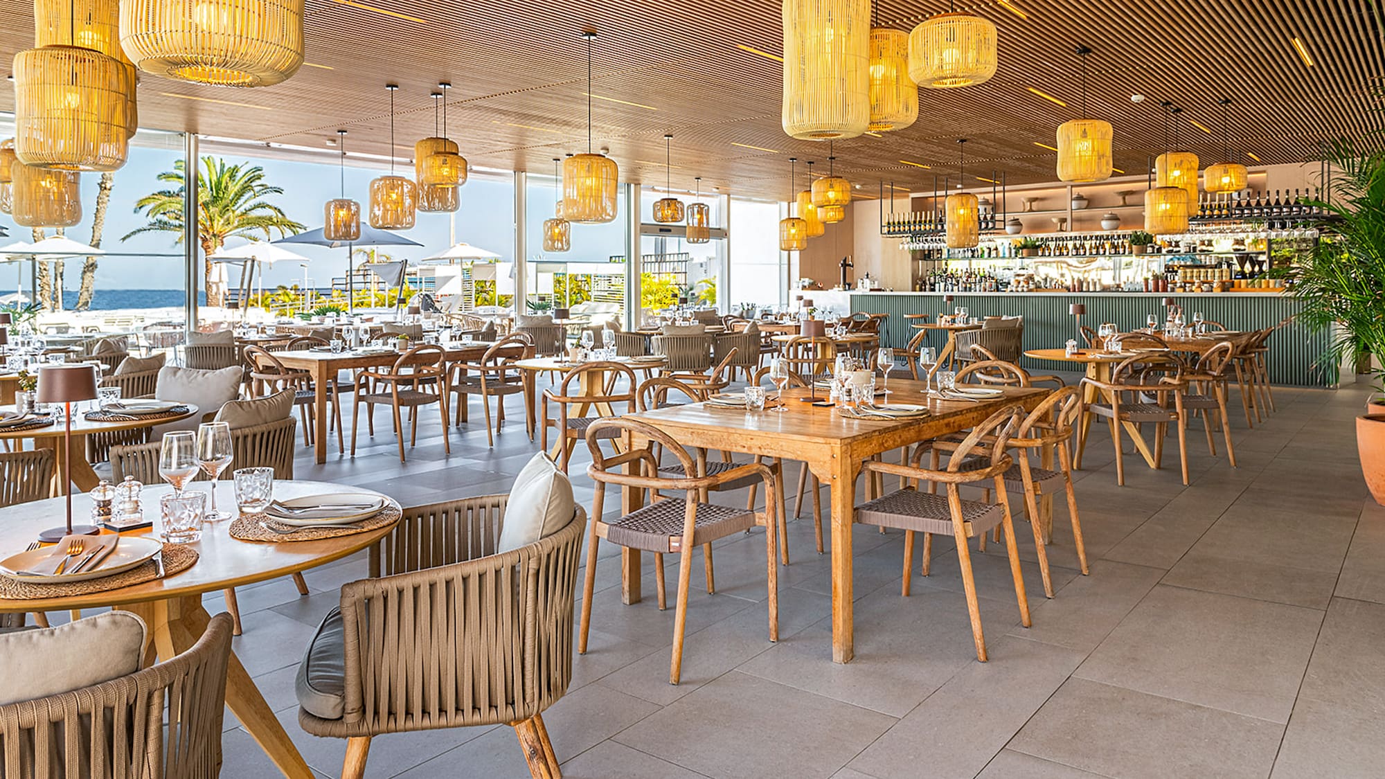 a restaurant with tables and chairs