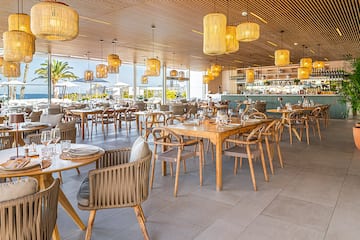 a restaurant with tables and chairs