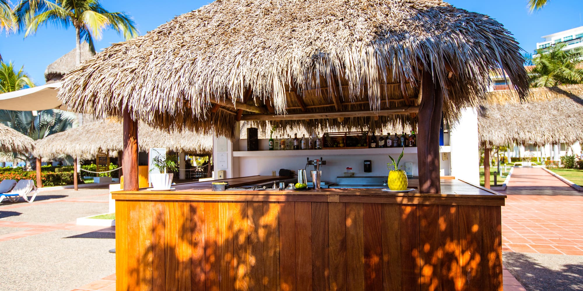 a bar with a straw roof