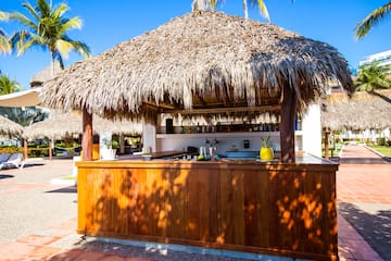 a bar with a straw roof