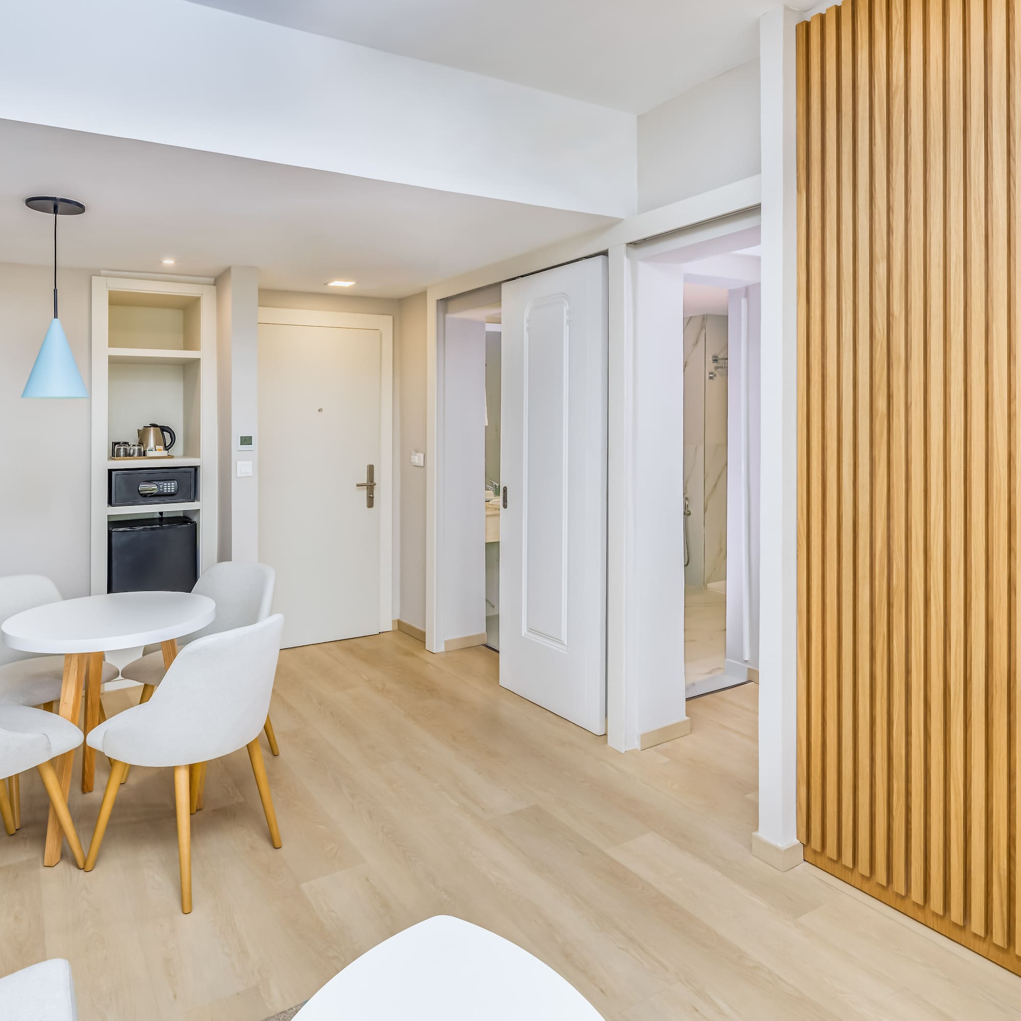 a room with a table and chairs