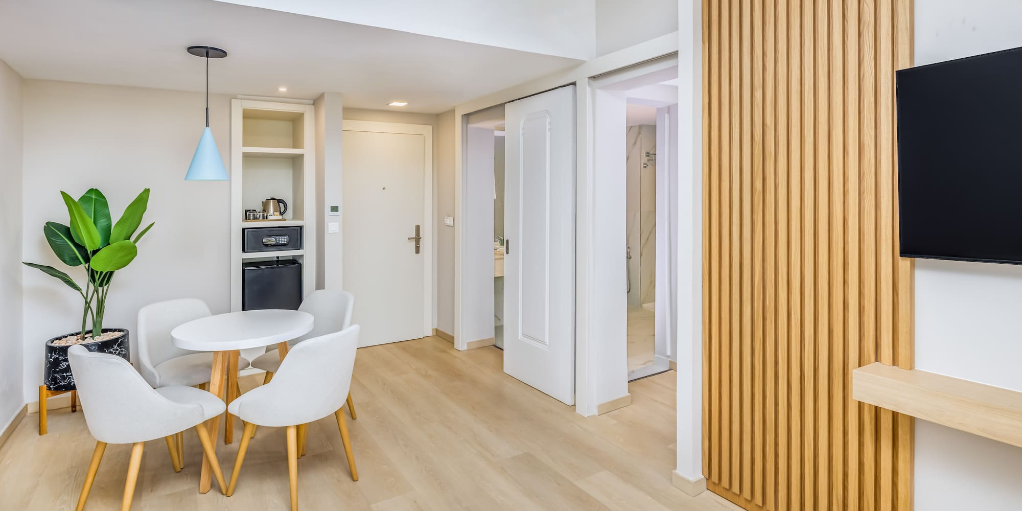 a room with a table and chairs