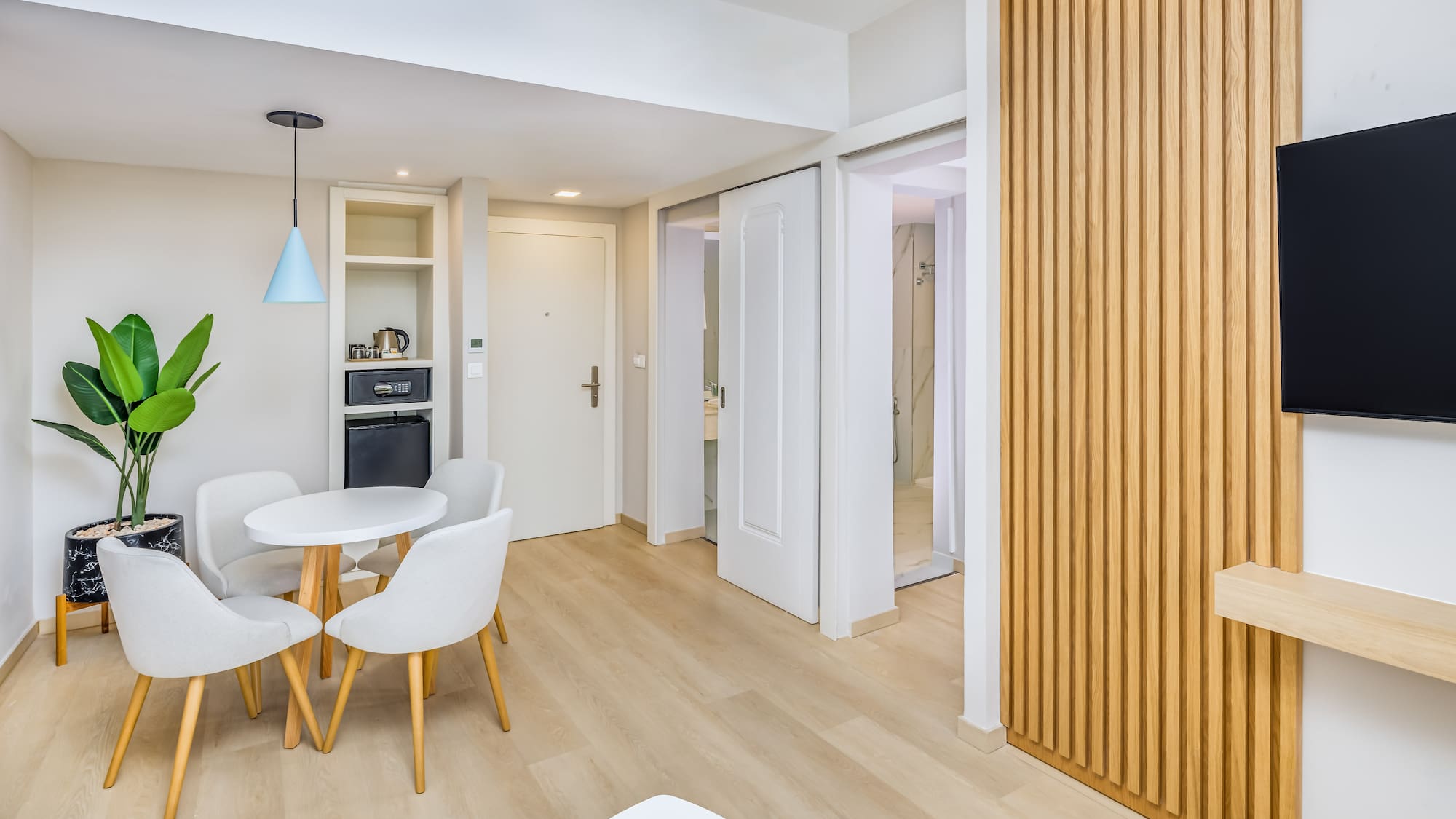 a room with a table and chairs