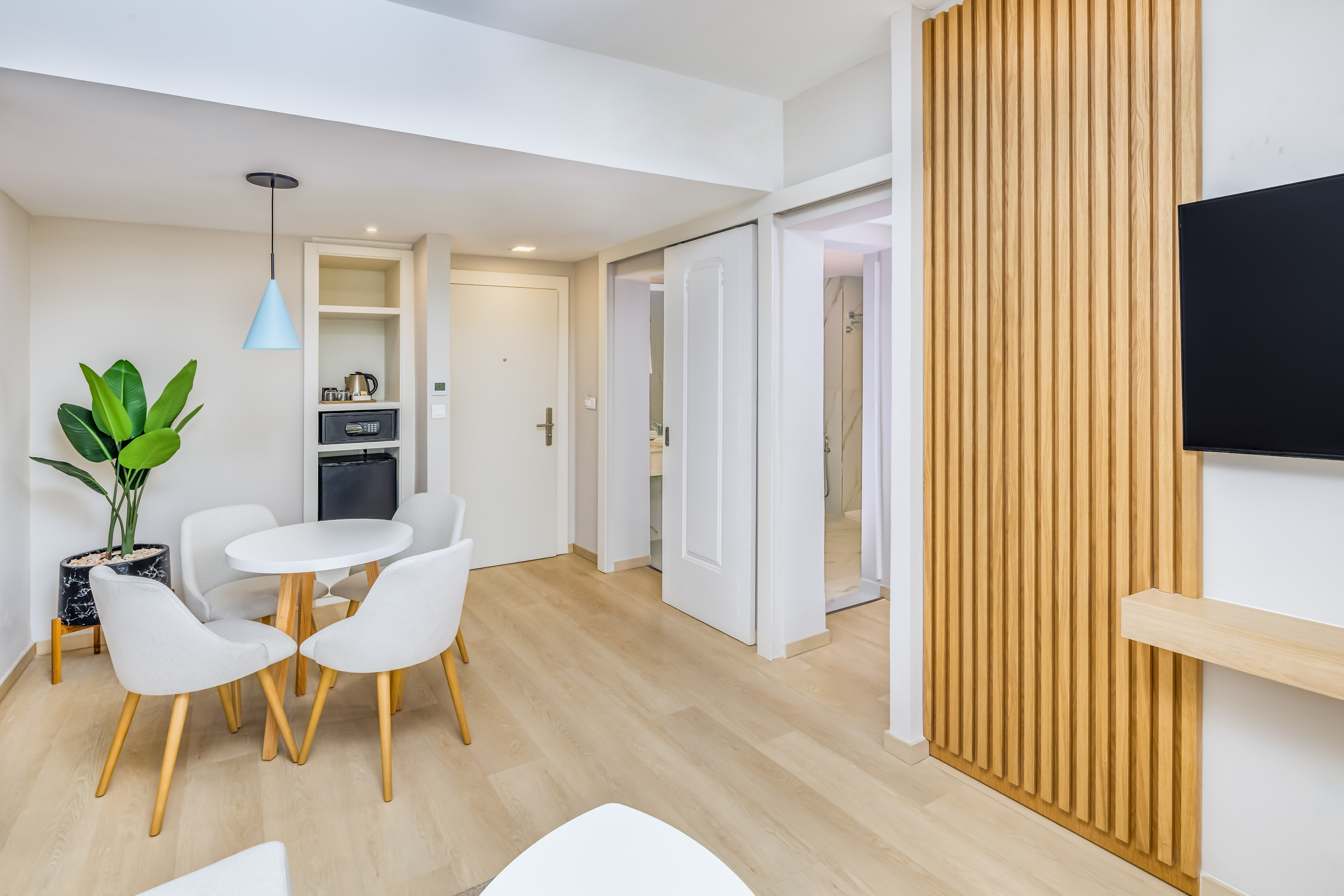 a room with a table and chairs