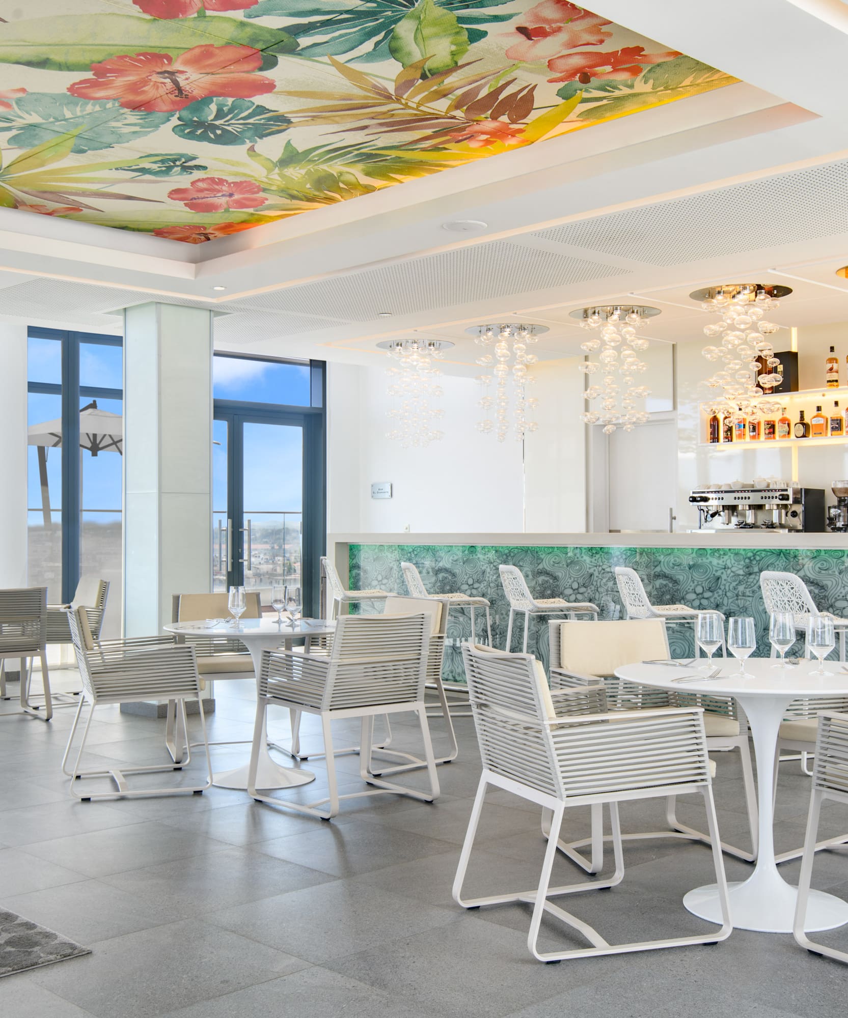 a room with tables and chairs