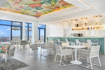 a room with tables and chairs