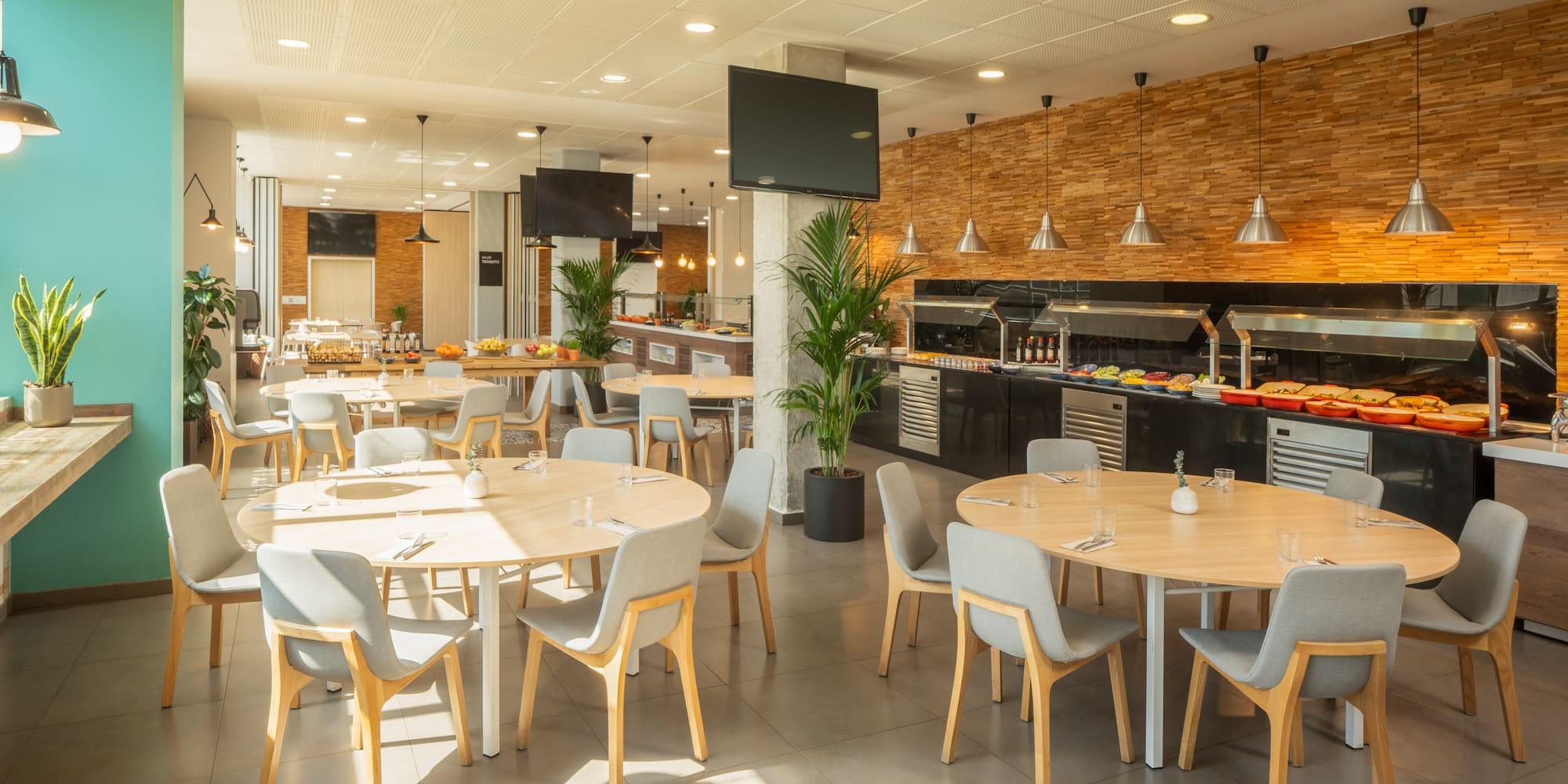 a restaurant with tables and chairs