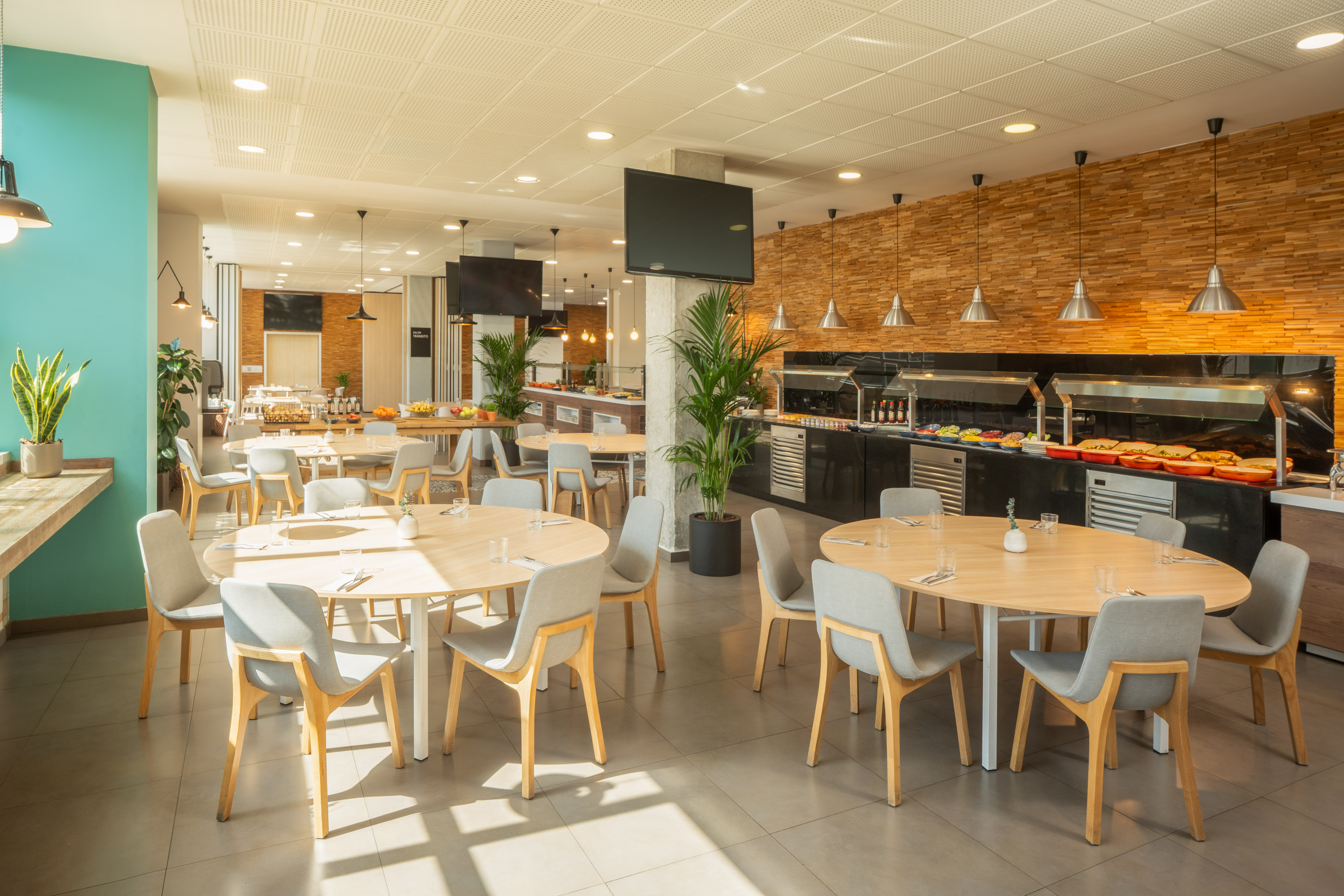 a restaurant with tables and chairs