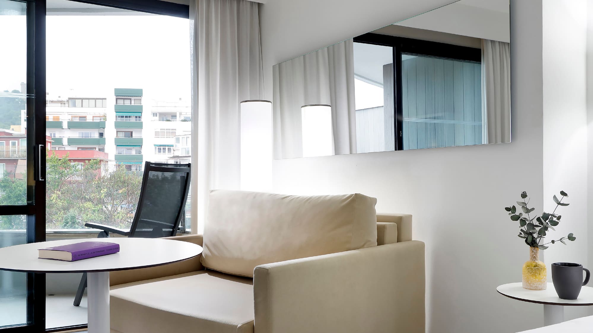 a room with a bed and a chair