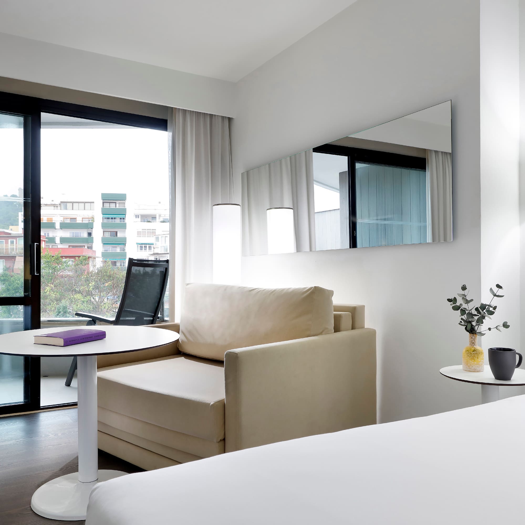 a room with a bed and a chair