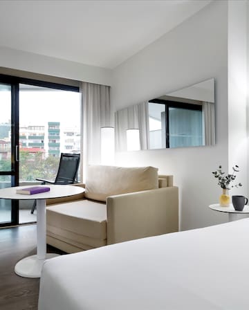 a room with a bed and a chair