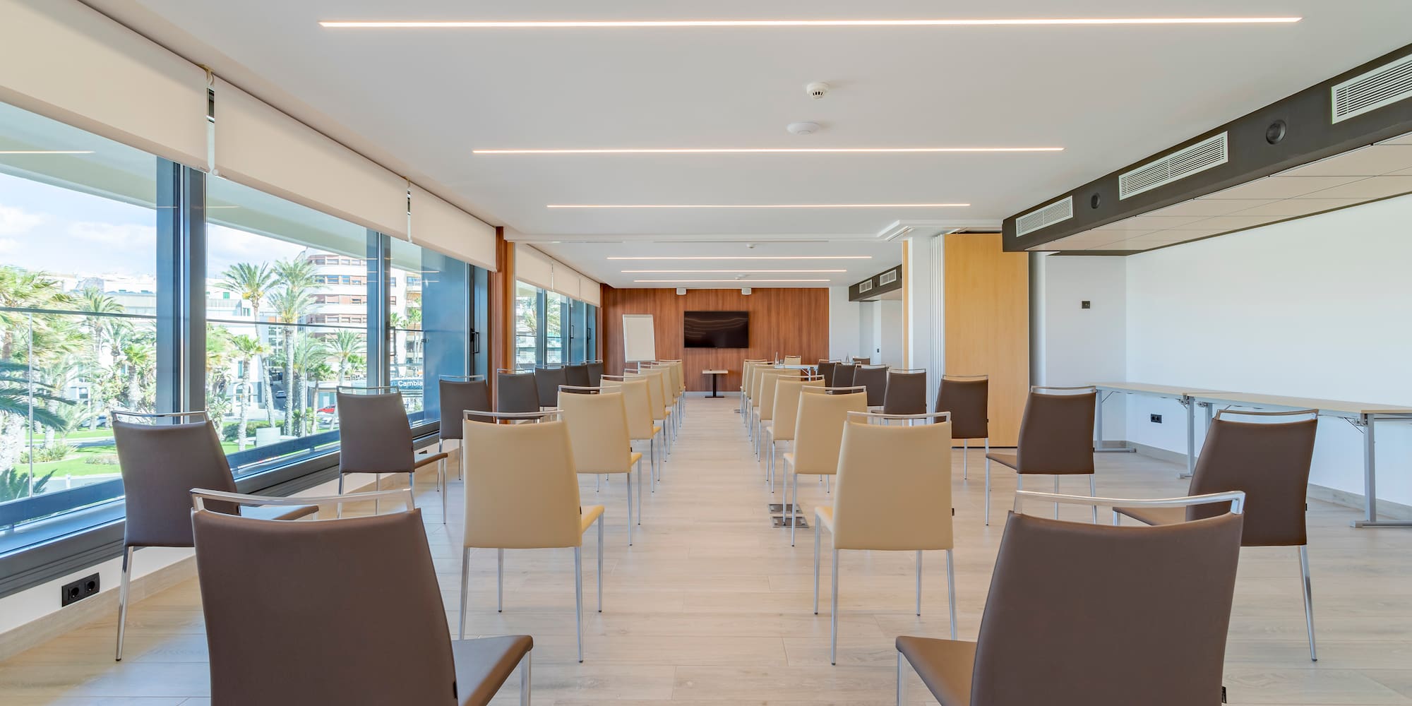 a room with chairs and tables