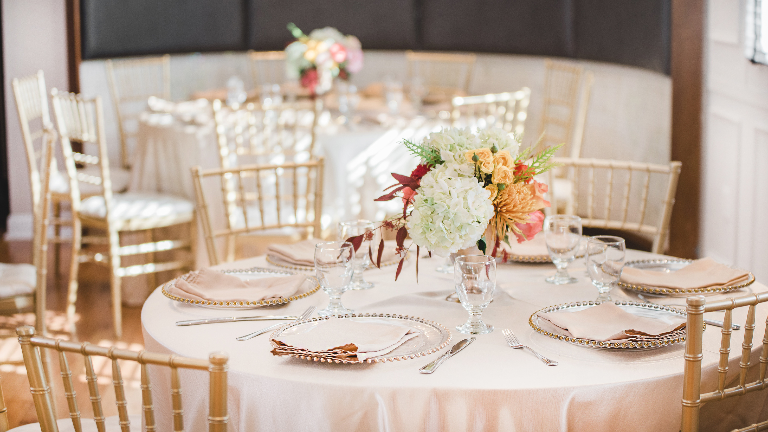 a table set for a wedding reception