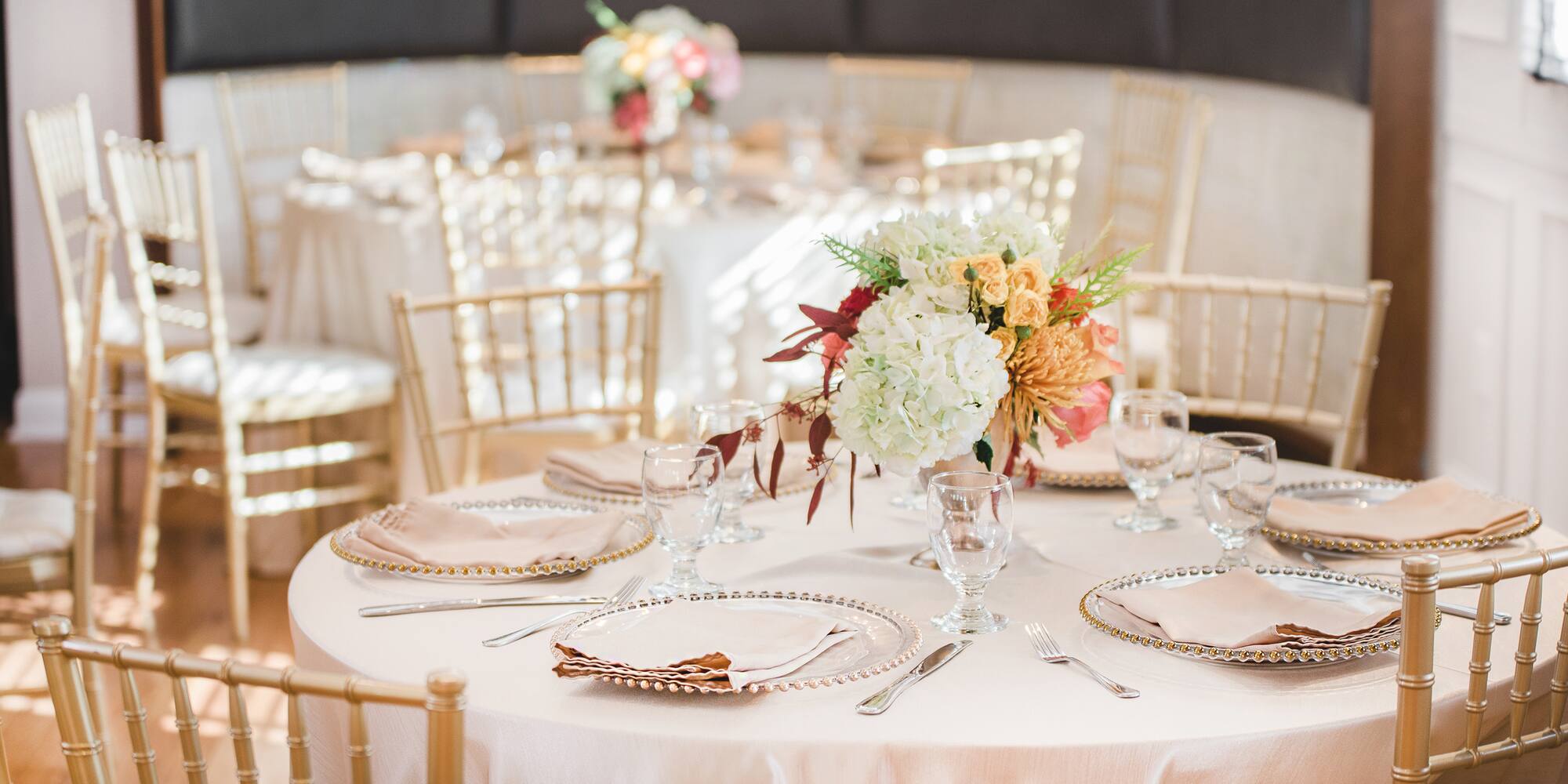 a table set for a wedding reception