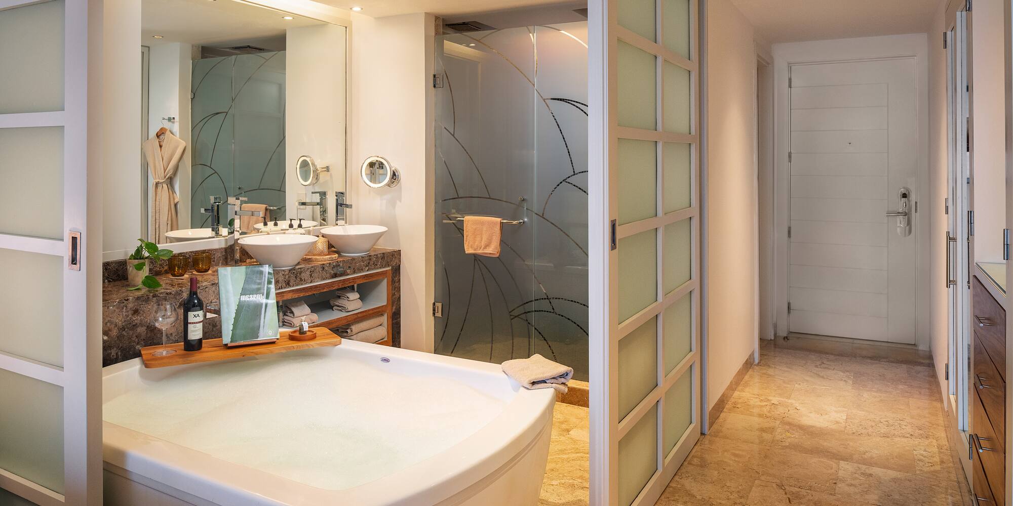 a bathroom with a tub and sink