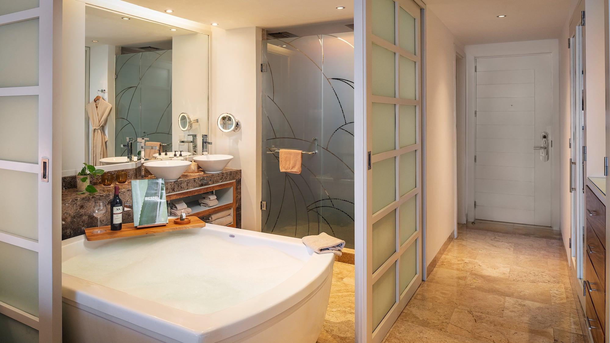a bathroom with a tub and sink