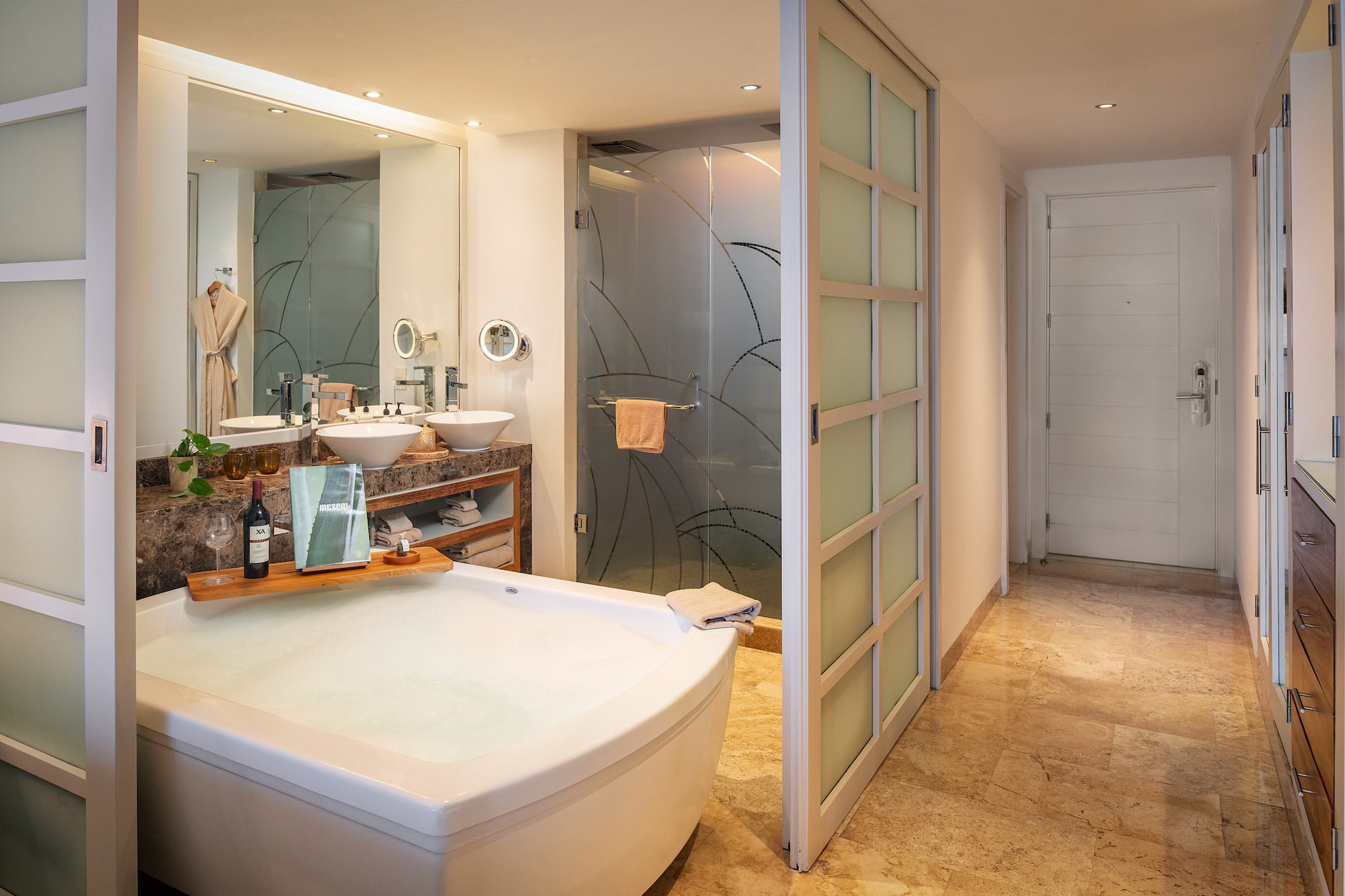 a bathroom with a tub and sink