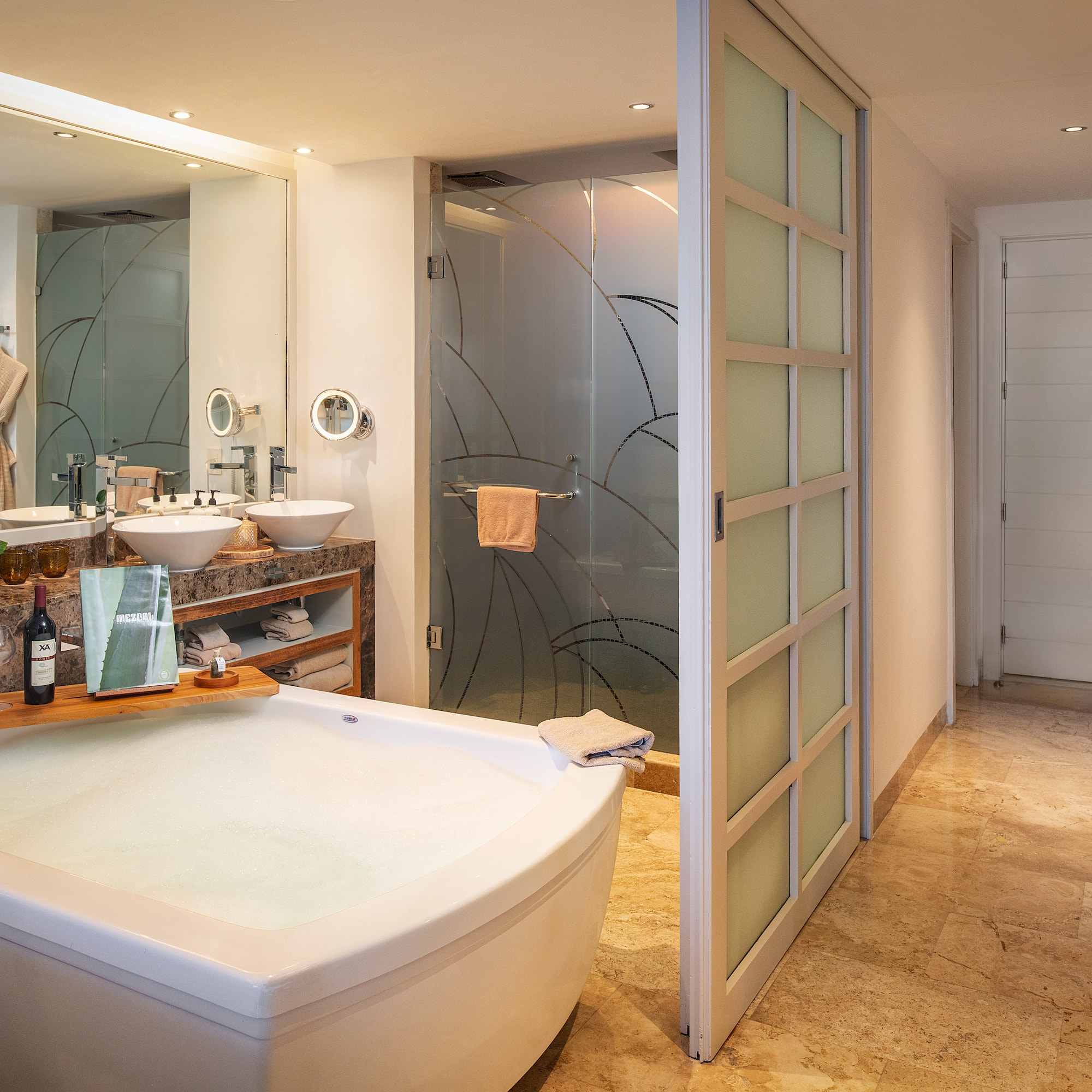 a bathroom with a tub and sink