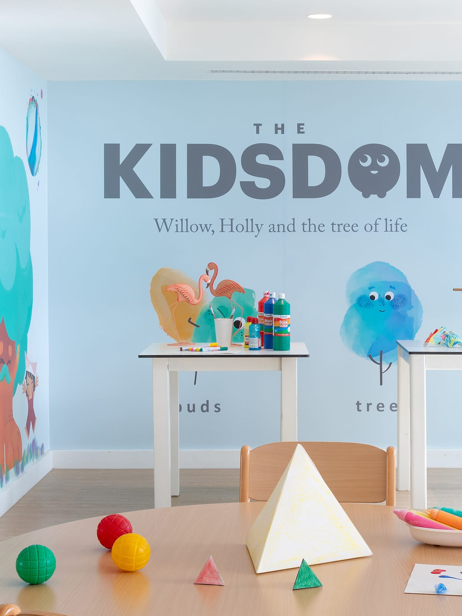 a room with a table and toys