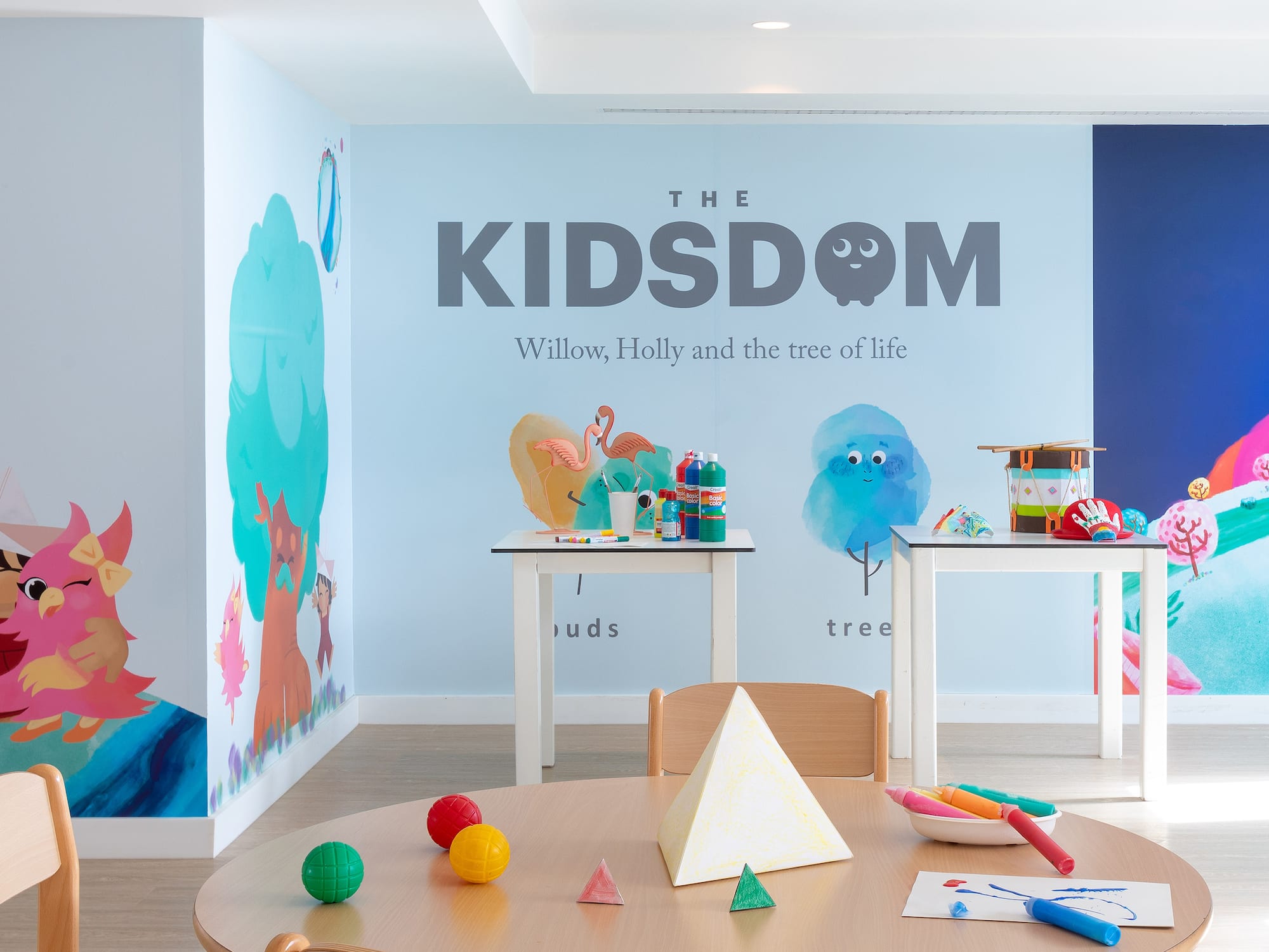 a room with a table and toys