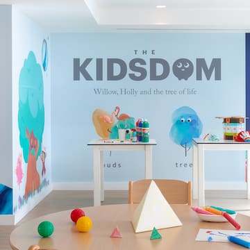 a room with a table and toys