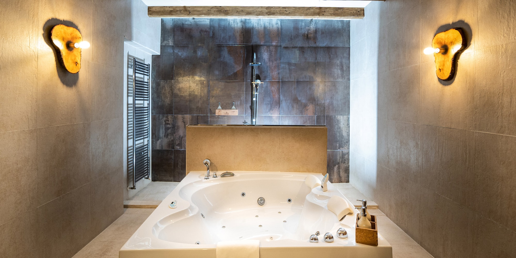 a large white bathtub in a bathroom