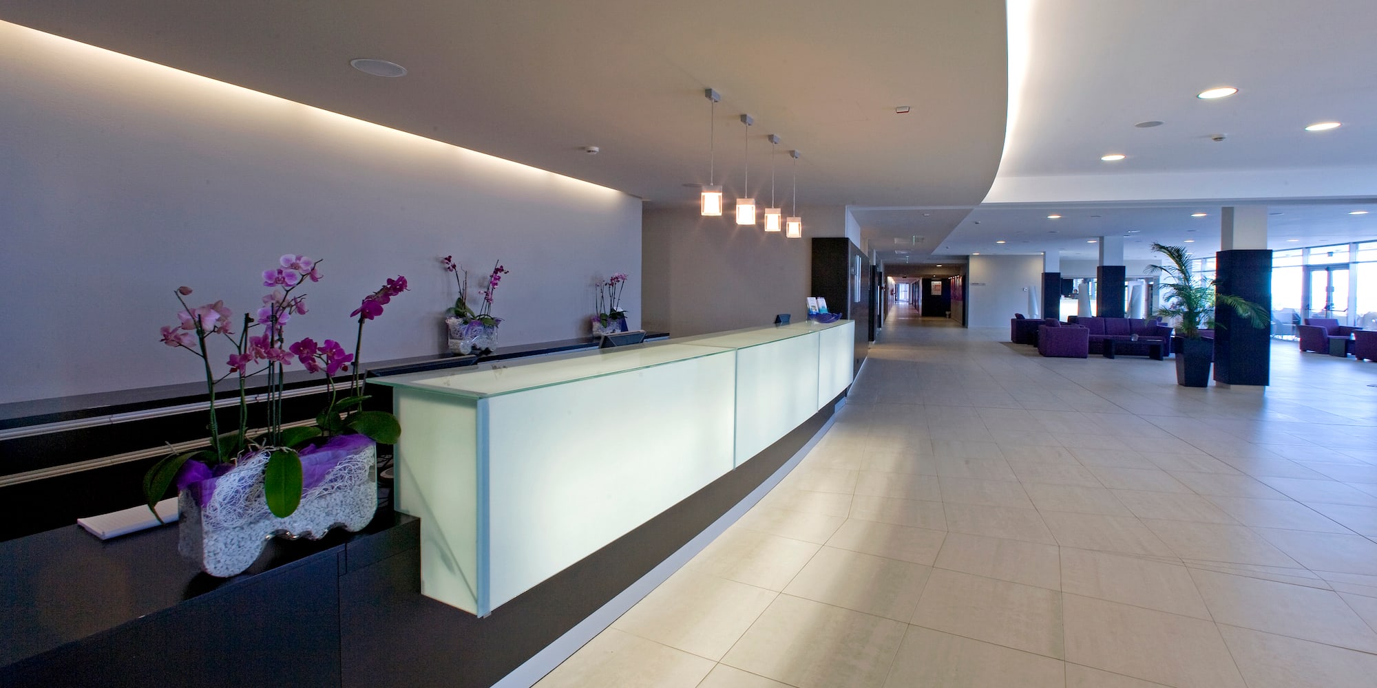 a reception desk in a hotel